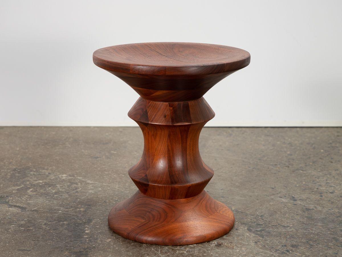 Original, first-issue time life stool A, designed by Charles and Ray Eames. A striking design first commissioned for the Time Life Building and informed by Ray Eames’ sculpture practice. Our vintage example exhibits a beautiful mosaic of walnut