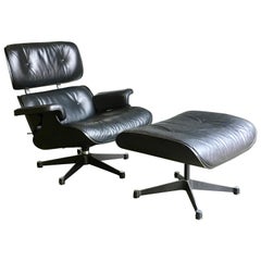 Eames Vitra 670 and 671 Black Nero Leather Lounger and Footstool in Black Ash