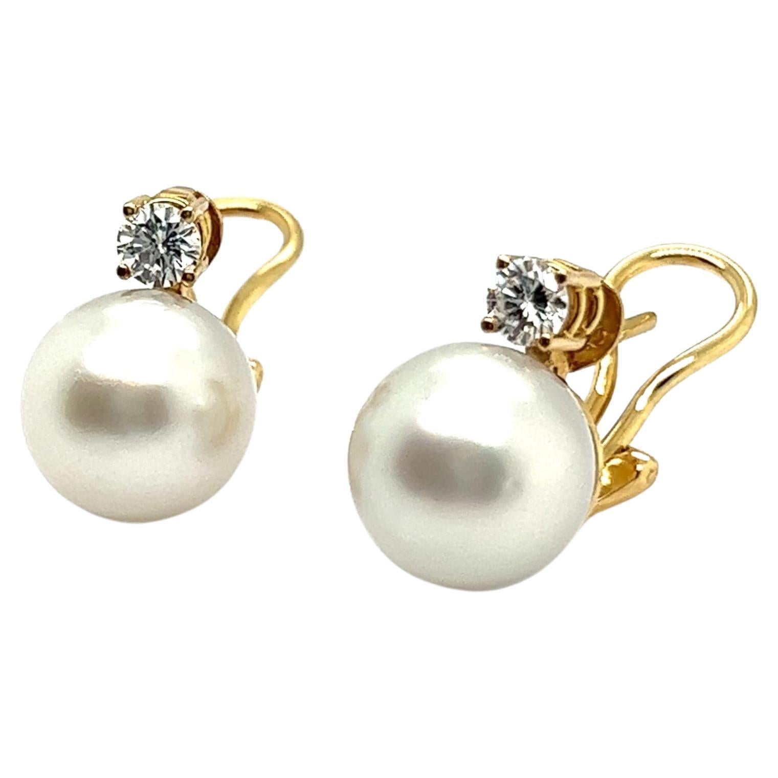 Ear clips with South Sea Pearls & Diamonds in 18 Karat Yellow Gold