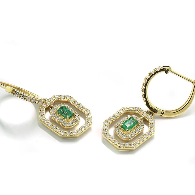 a pair of earrings,  shape: round and octagonal, with 2 octagonal cut emeralds appr. 0,35 carat in total, luscious green in transparent quality, 94 natural brilliant cut white diamonds approx.  0,78 carat in total, color: H-I, clarity: SI-p1.