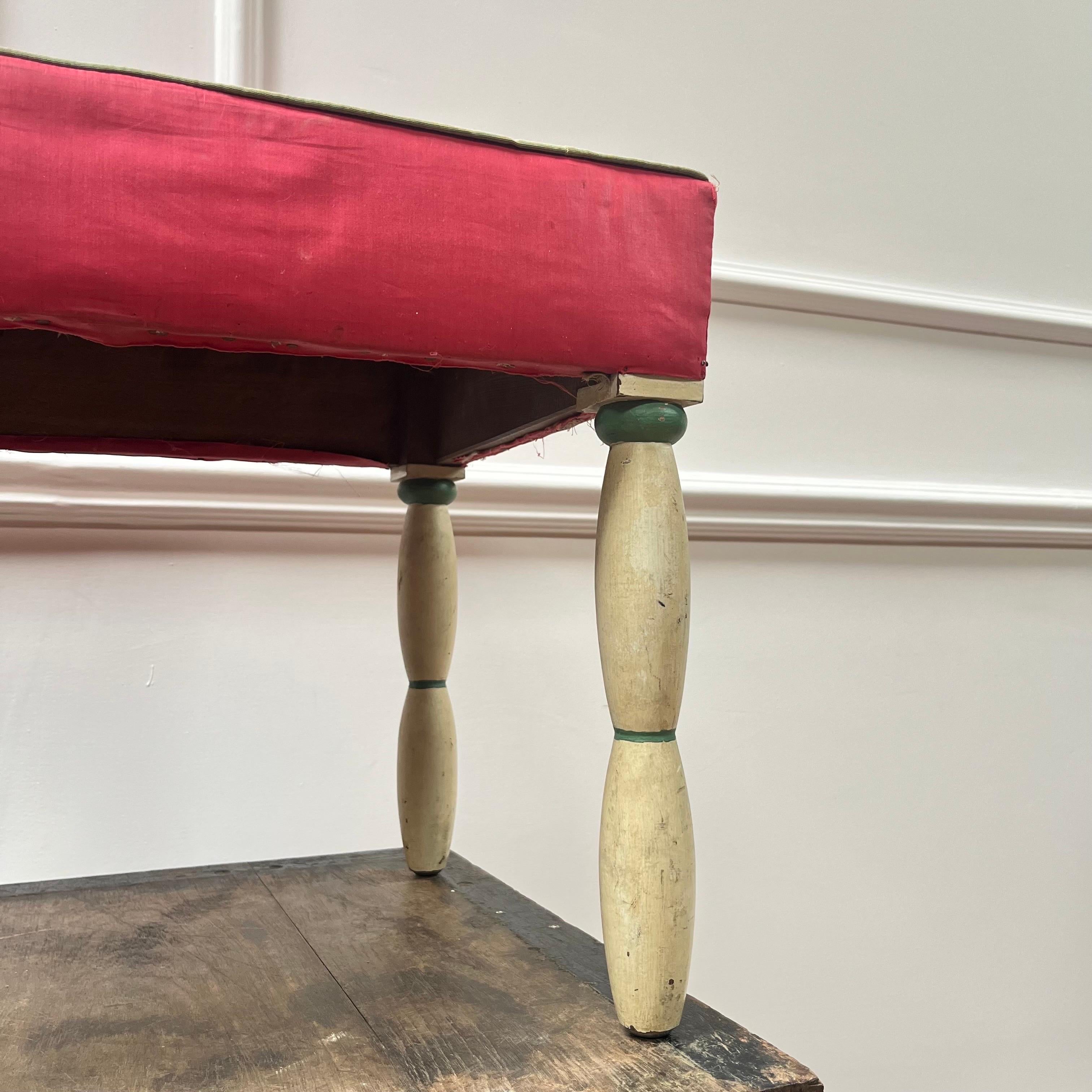 Most probably produced by one of the decorator houses with painted totem legs and original waxed cotton covering. 

Possibly Colefax and Fowler 

English, 1930s 

