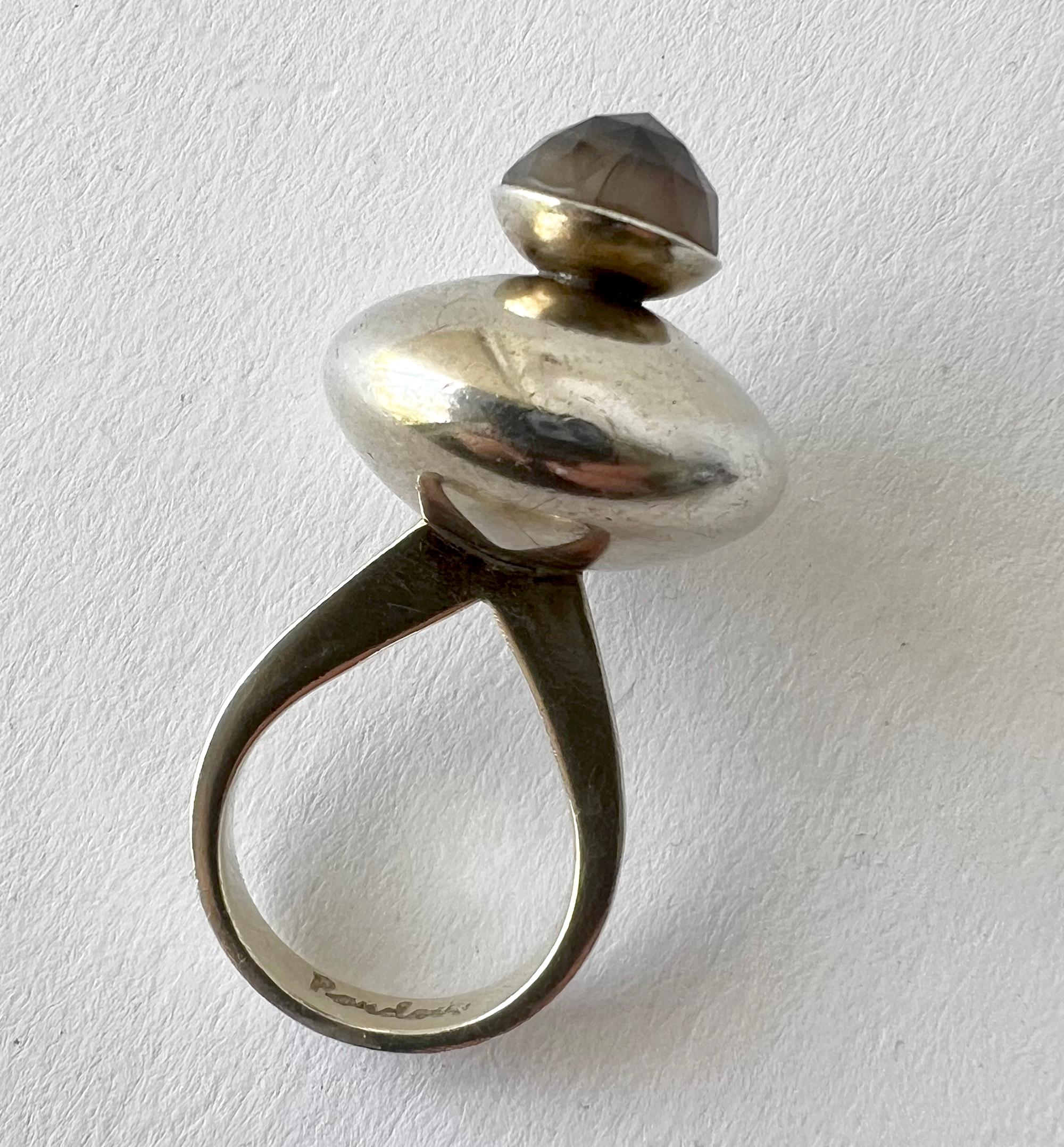 Sterling silver and faceted quartz cocktail ring created by master jeweler, artist and designer Earl Pardon of New York. Ring is a finger size 6.75 to 7 due to its unusual shaped shank.  Signed Pardon and in good vintage 1960s condition showing some