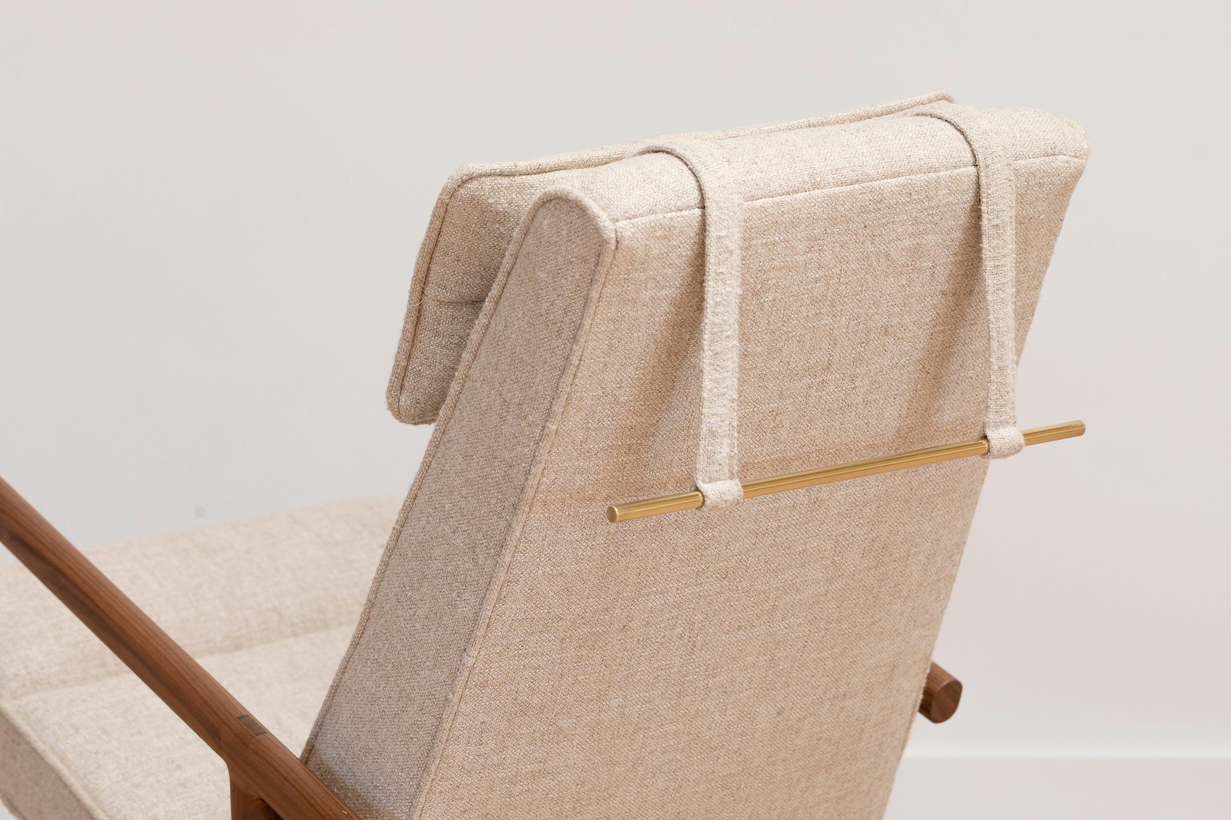 Solid wood construction with hand-cut joinery and custom upholstered seat and seat back. This Rocker shown in walnut and maharam plume ciabatta ivory textured linen.

In stock leather choice: black, olive, camel or vegtan leather.
Wood choice: