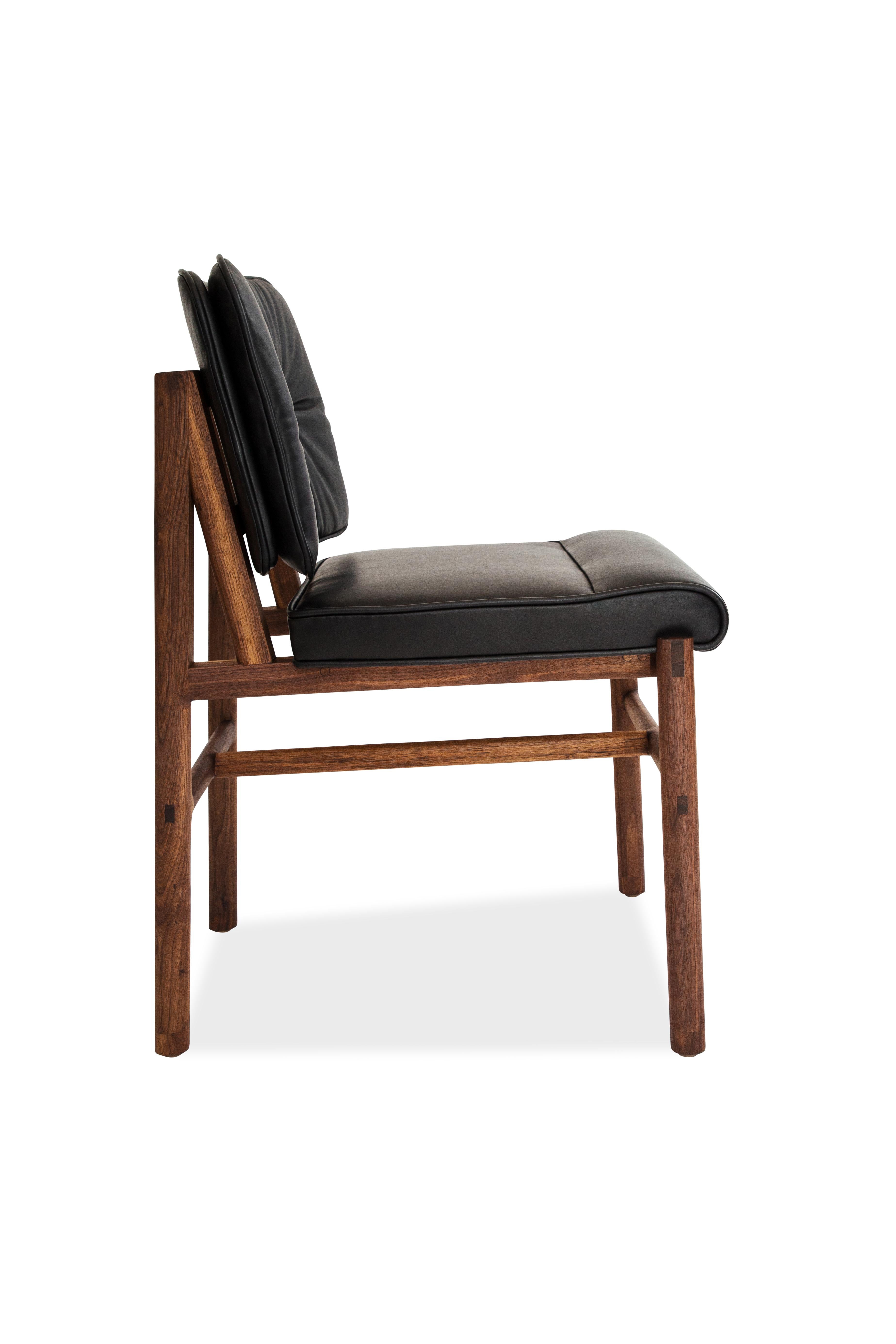 black leather and wood dining chair