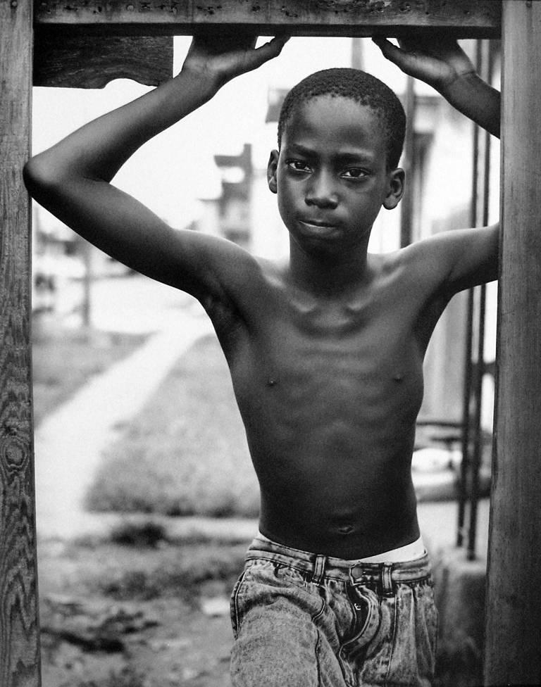 Earlie Hudnall Jr. Portrait Photograph - Looking Out, 3rd Ward, Houston, Texas