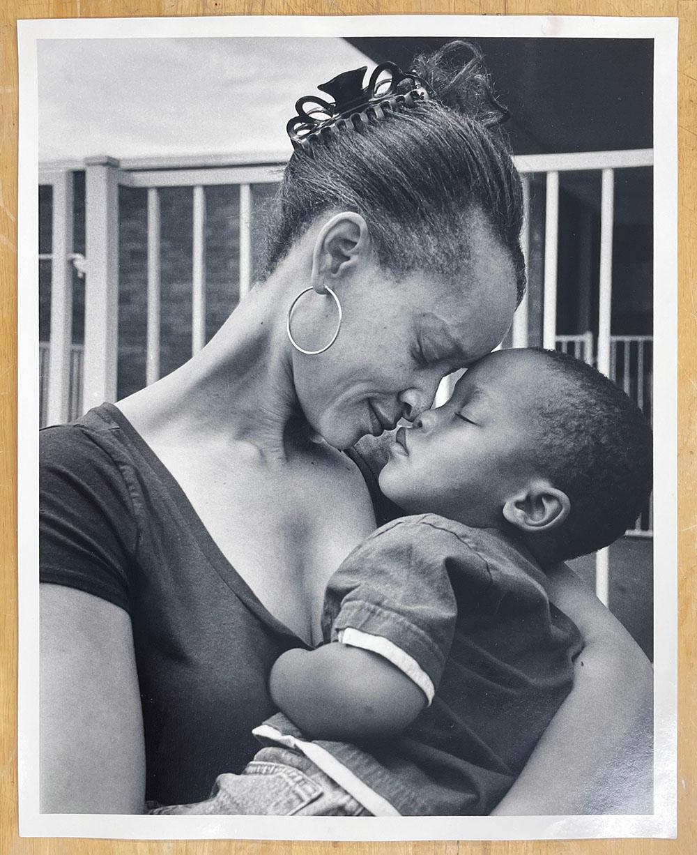 Mother and Son, Hurricane Ike - Family, Parent, Child, Intimate - Photograph by Earlie Hudnall Jr.