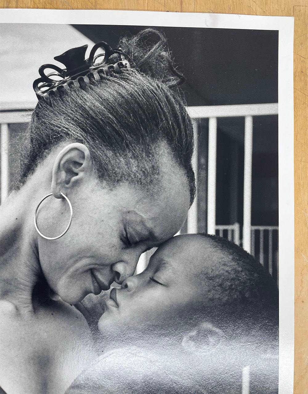 Mother and Son, Hurricane Ike - Family, Parent, Child, Intimate - Black Portrait Photograph by Earlie Hudnall Jr.