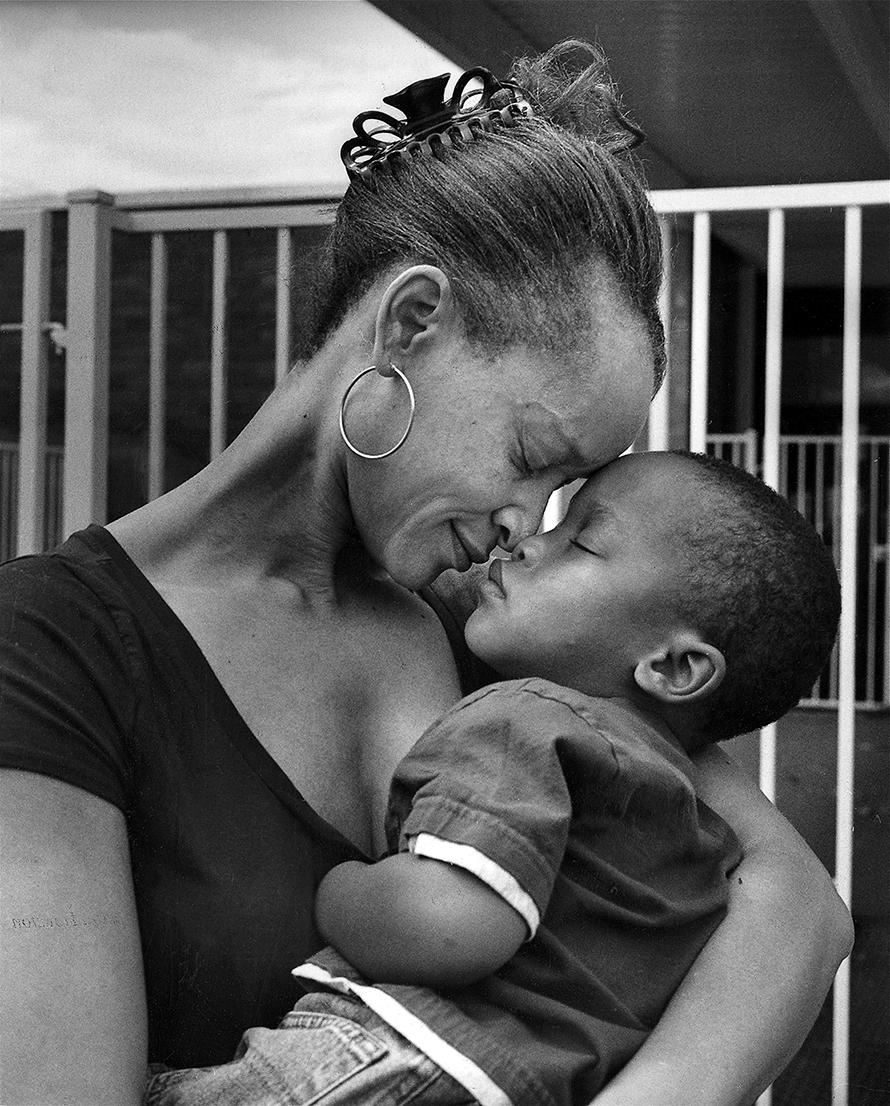 Earlie Hudnall Jr. Portrait Photograph - Mother and Son, Hurricane Ike - Family, Parent, Child, Intimate