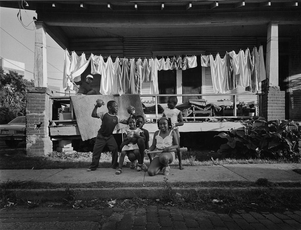 Black and White Photograph Earlie Hudnall Jr. - A Champion, 4th Ward, Houston, TX - Child, Kids, House, Black Artist