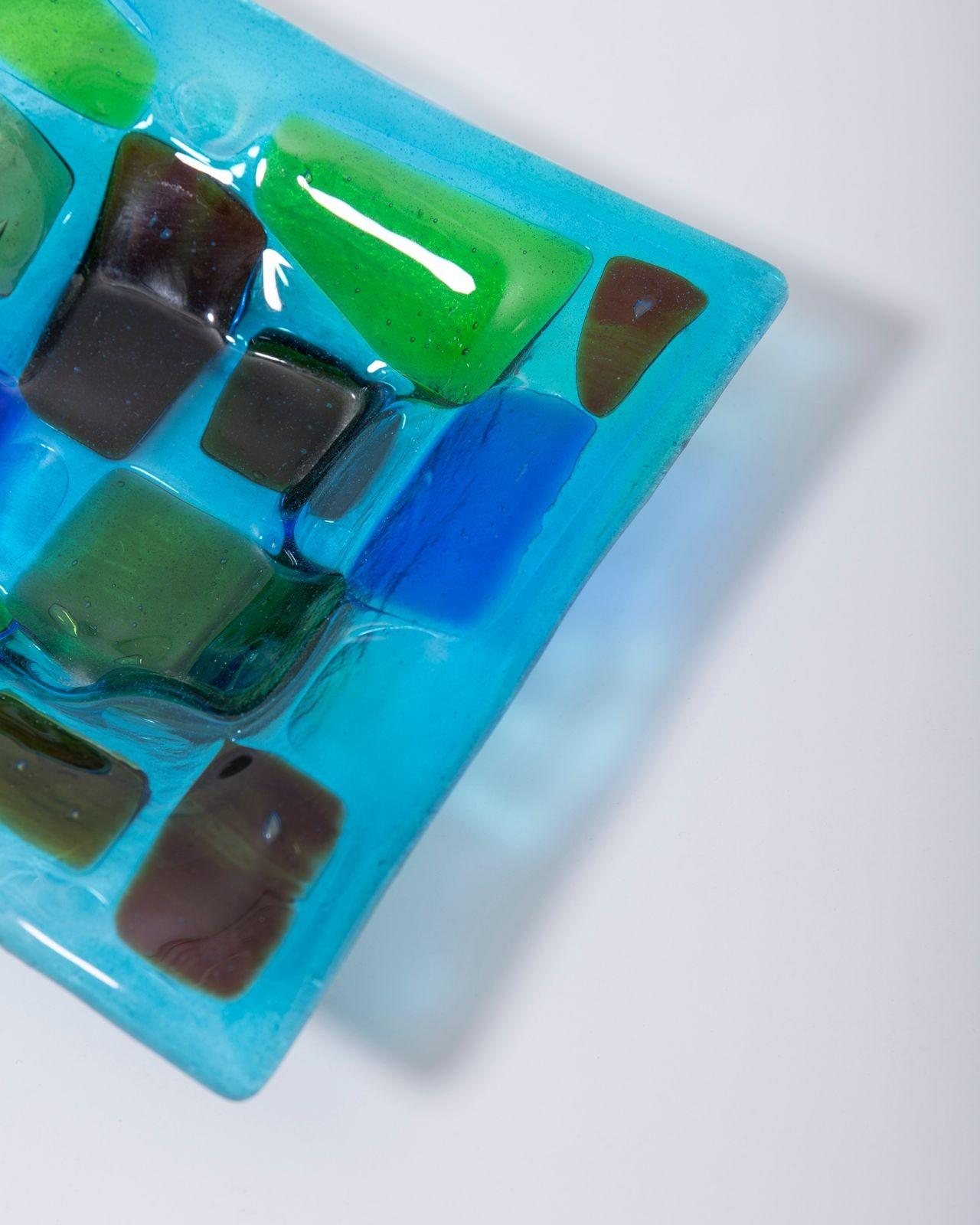 Earliest stained glass patchwork square dish signed 'Frances Stewart & Michael Higgins'. Michael Higgins was a King's Scholar at Eton College and studied at Cambridge University. He became head of visual design at the Chicago Institute of Design.