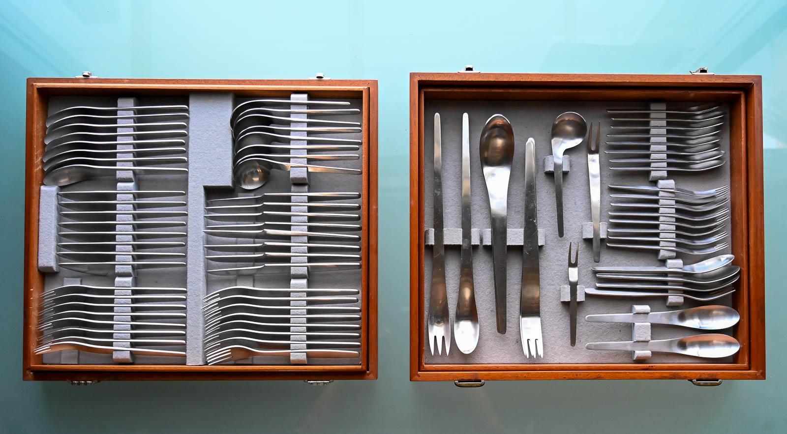 Early 103 piece set of Arne Jacobsen for Anton Michelsen Flatware, 1965 Stainless steel, with markings. Very good to excellent condition. 

Complete canteen service for eight also includes two large salad spoons, large salad fork, 4 extra