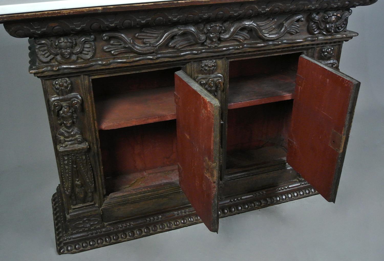 18th Century and Earlier Early 17th Century Figural Carved Oak Livery Cupboard c. 1620 For Sale