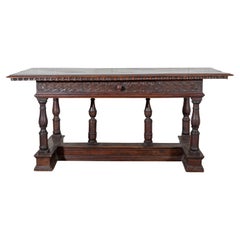 Tavolo in noce lombardo Luigi XIV del primo Seicento con gambe a balaustro