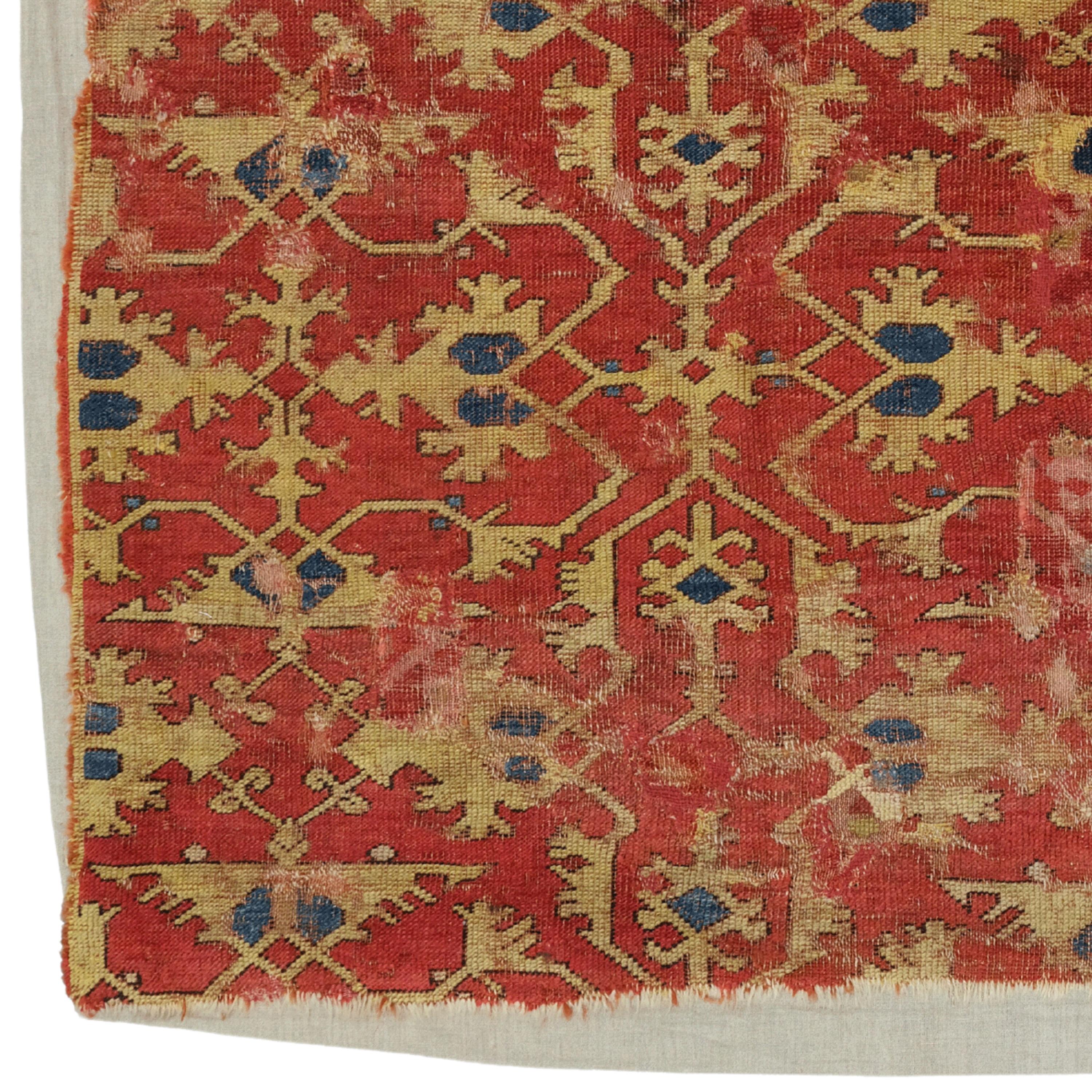 Early 17th Century Lotto Rug Fragment  Antique Fragment

“Lotto” is a term of convenience for the repeated pattern of arabesque forms used in many sixteenth- and seventeenth-century Turkish rugs. The term is taken from the name of the