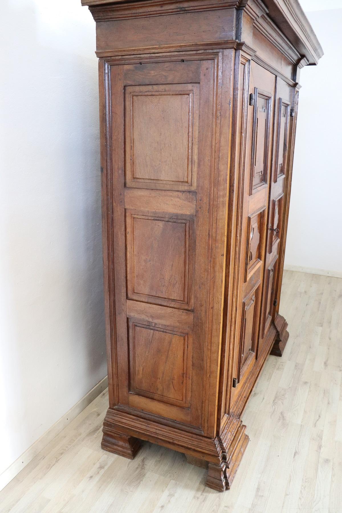Italian Early 17th Century Louis XIV Walnut Hand Carved Antique Wardrobe or Armoire