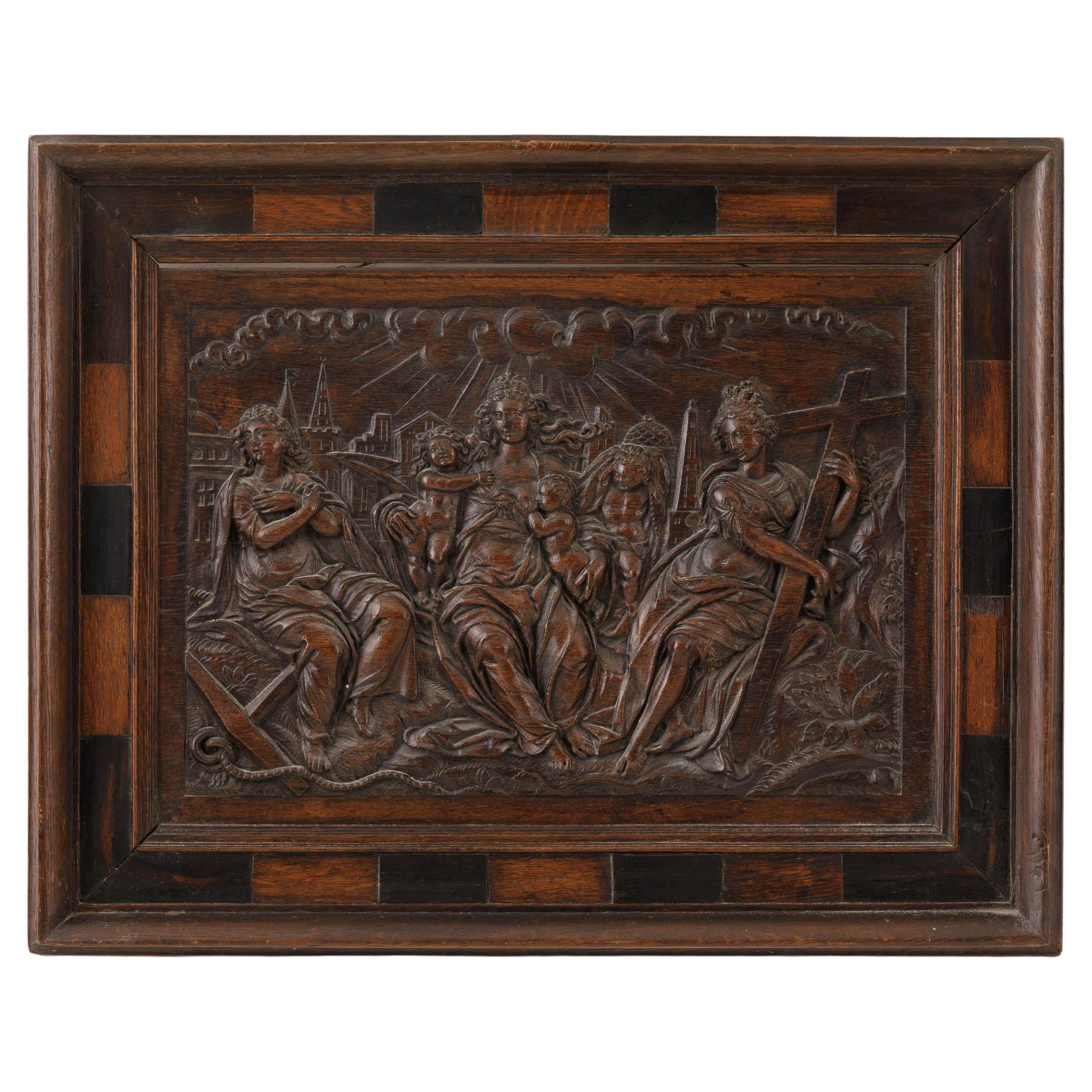 Relief en Oak du début du 17e siècle représentant les trois vertus divines en vente