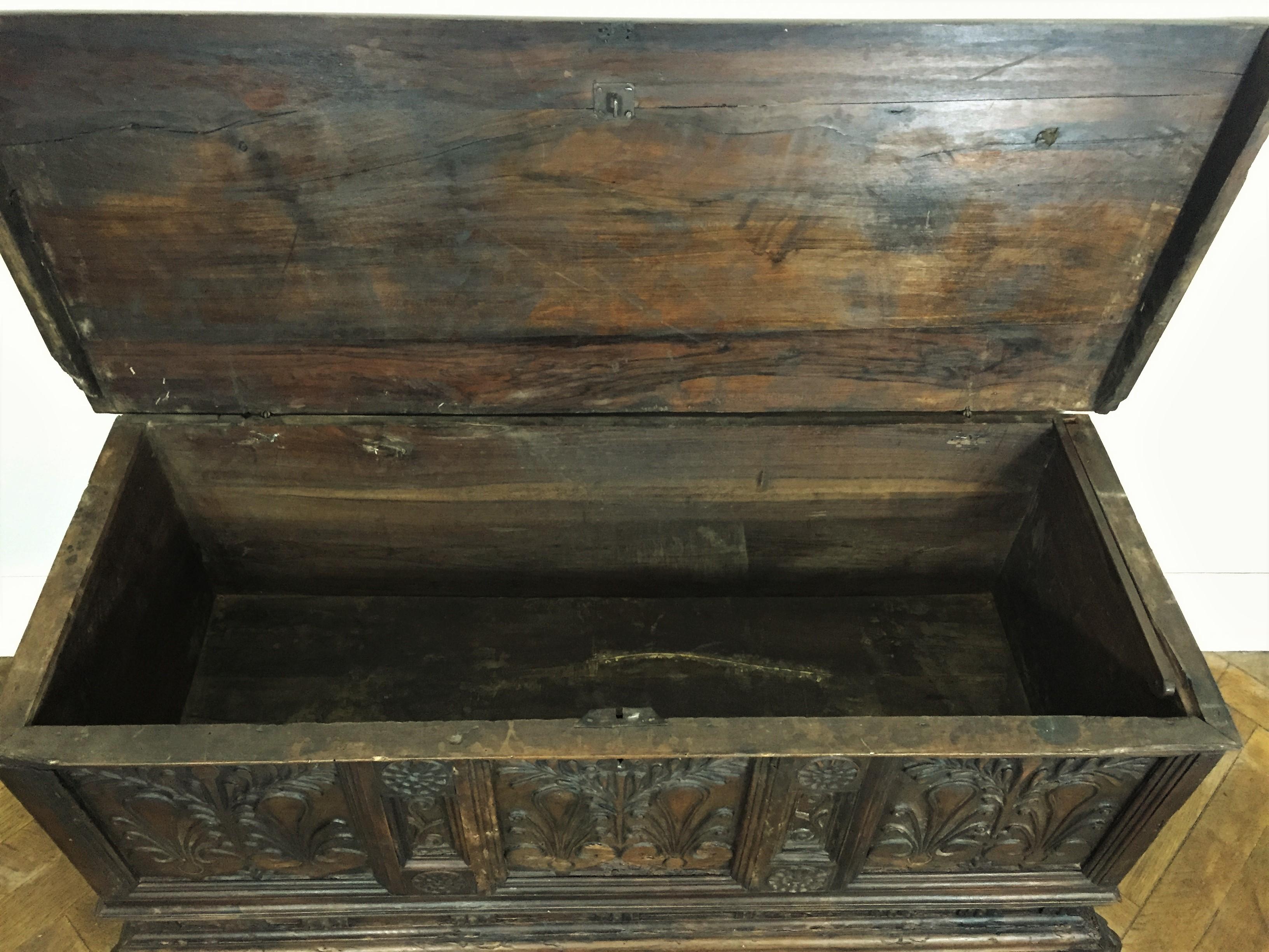 Hand-Carved Early 17th Century Renaissance Chest in Walnut with Lion Feet
