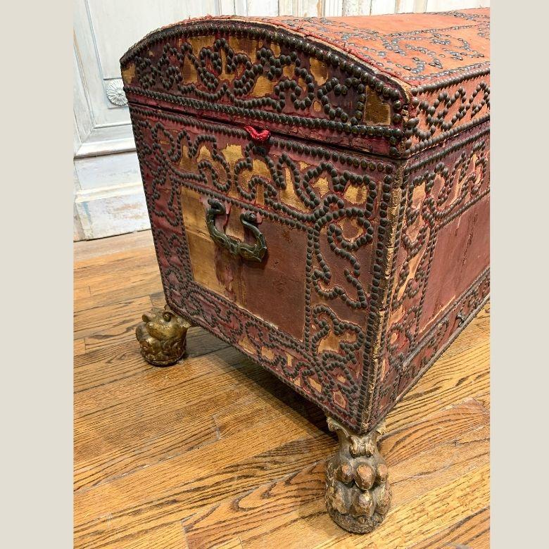 This extremely rare early 17th century Venetian dome topped chest is an incredible piece with its remarkably complicated nail head designs retaining some of the original velvet. The interior is finished in silk and nail heads and includes a single