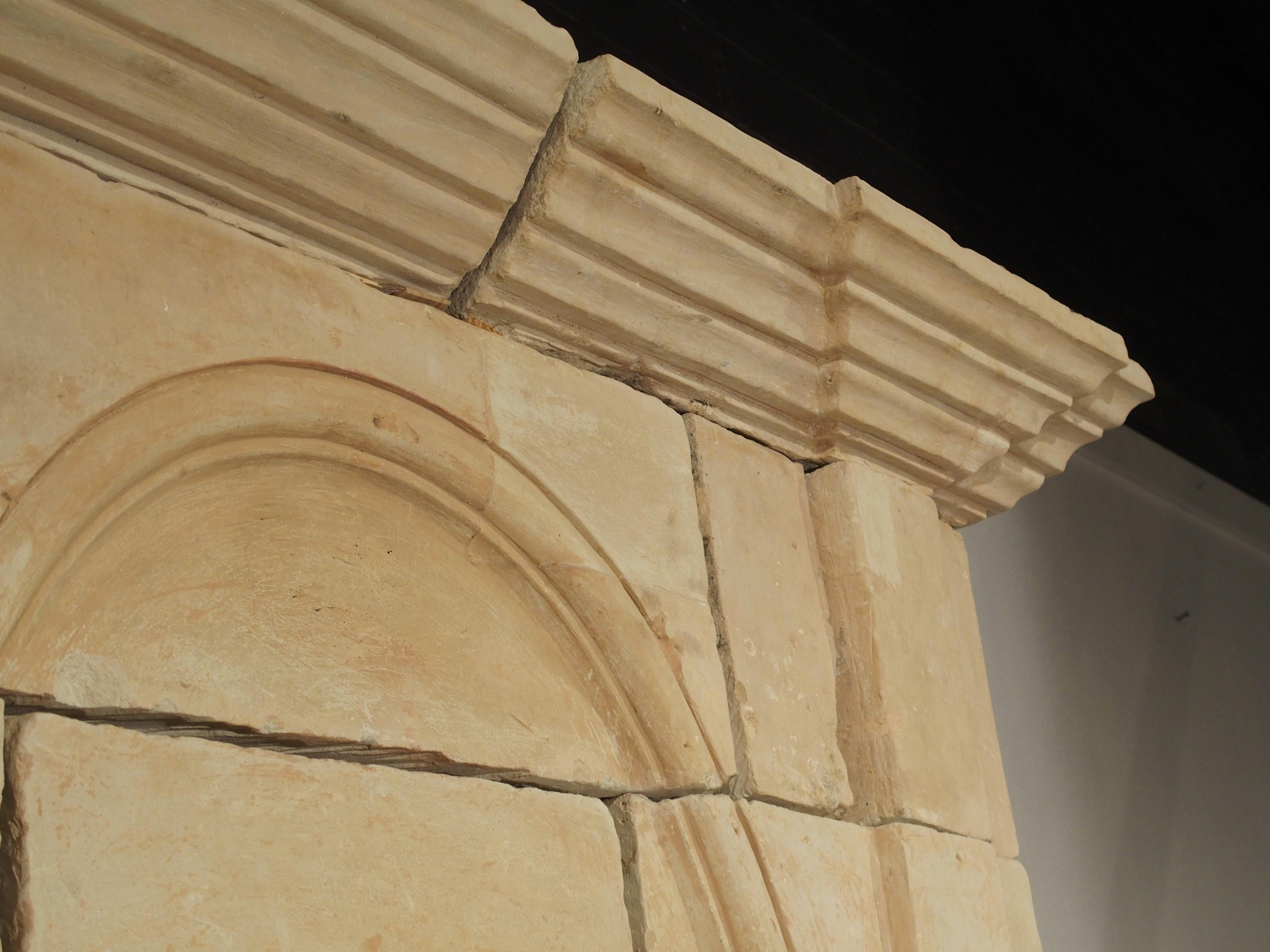Early 1800s Carved Limestone Trumeau Fireplace Mantel from Loire Valley, France 4