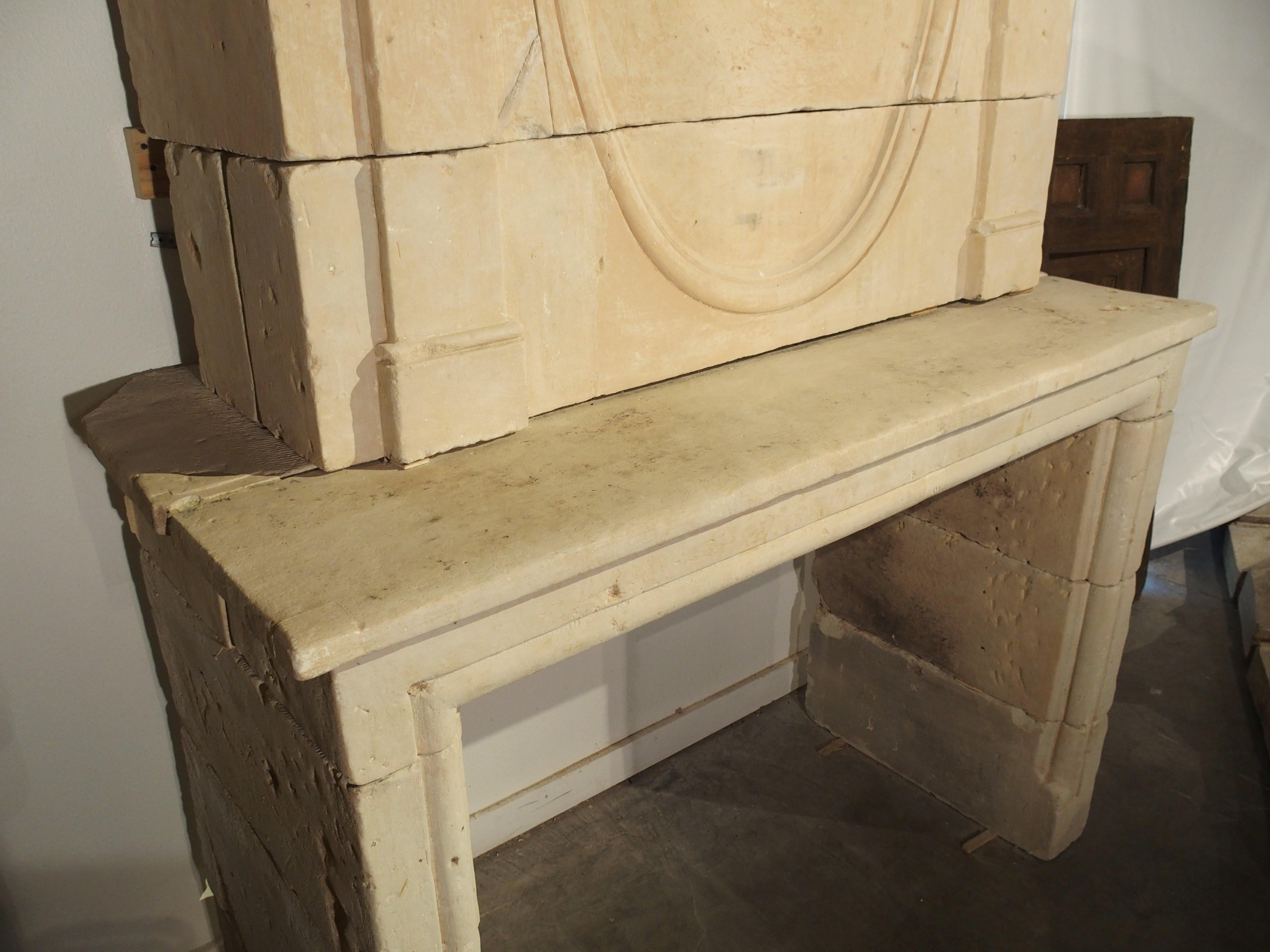 Early 1800s Carved Limestone Trumeau Fireplace Mantel from Loire Valley, France 5