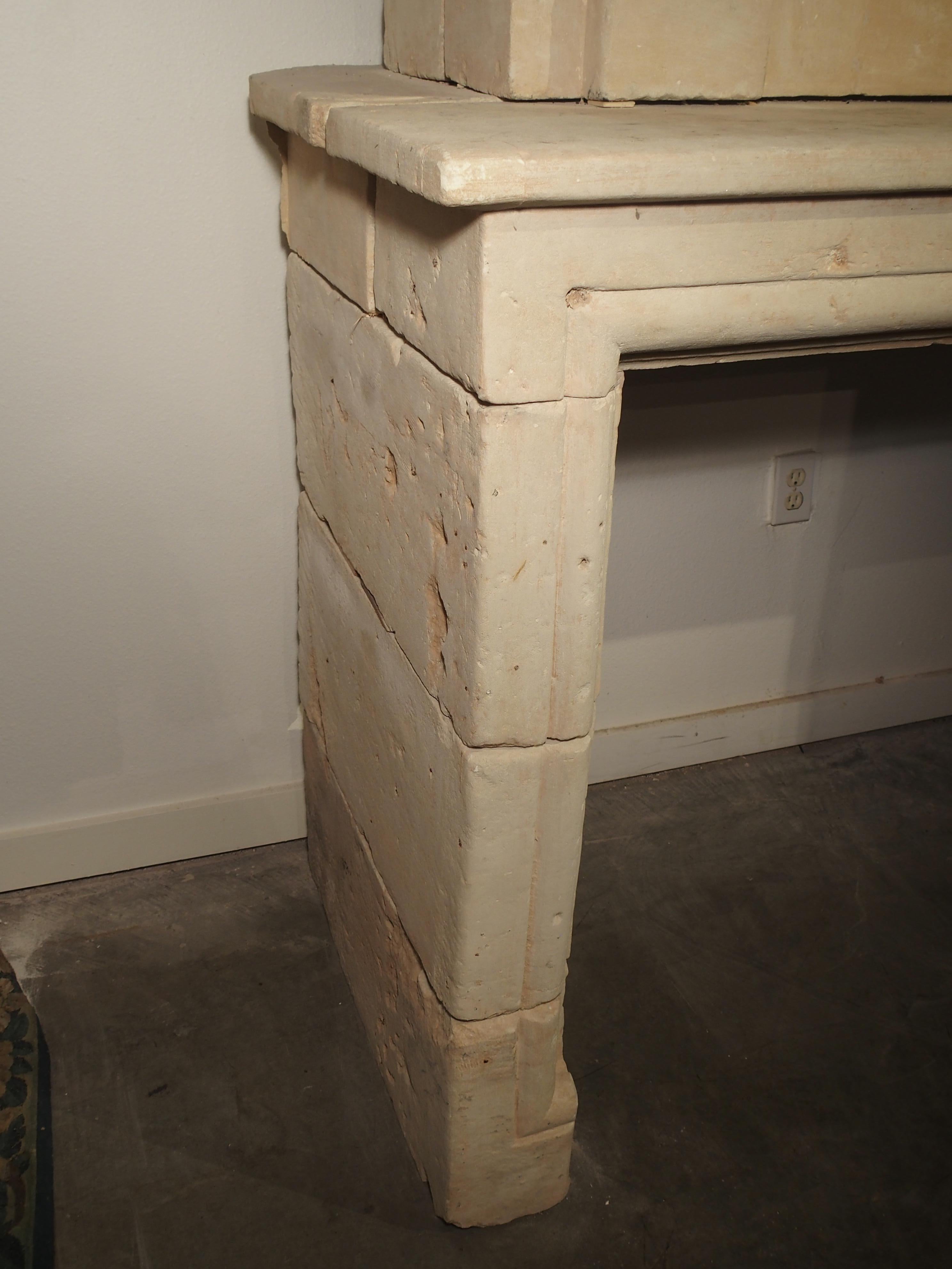 Early 1800s Carved Limestone Trumeau Fireplace Mantel from Loire Valley, France 7