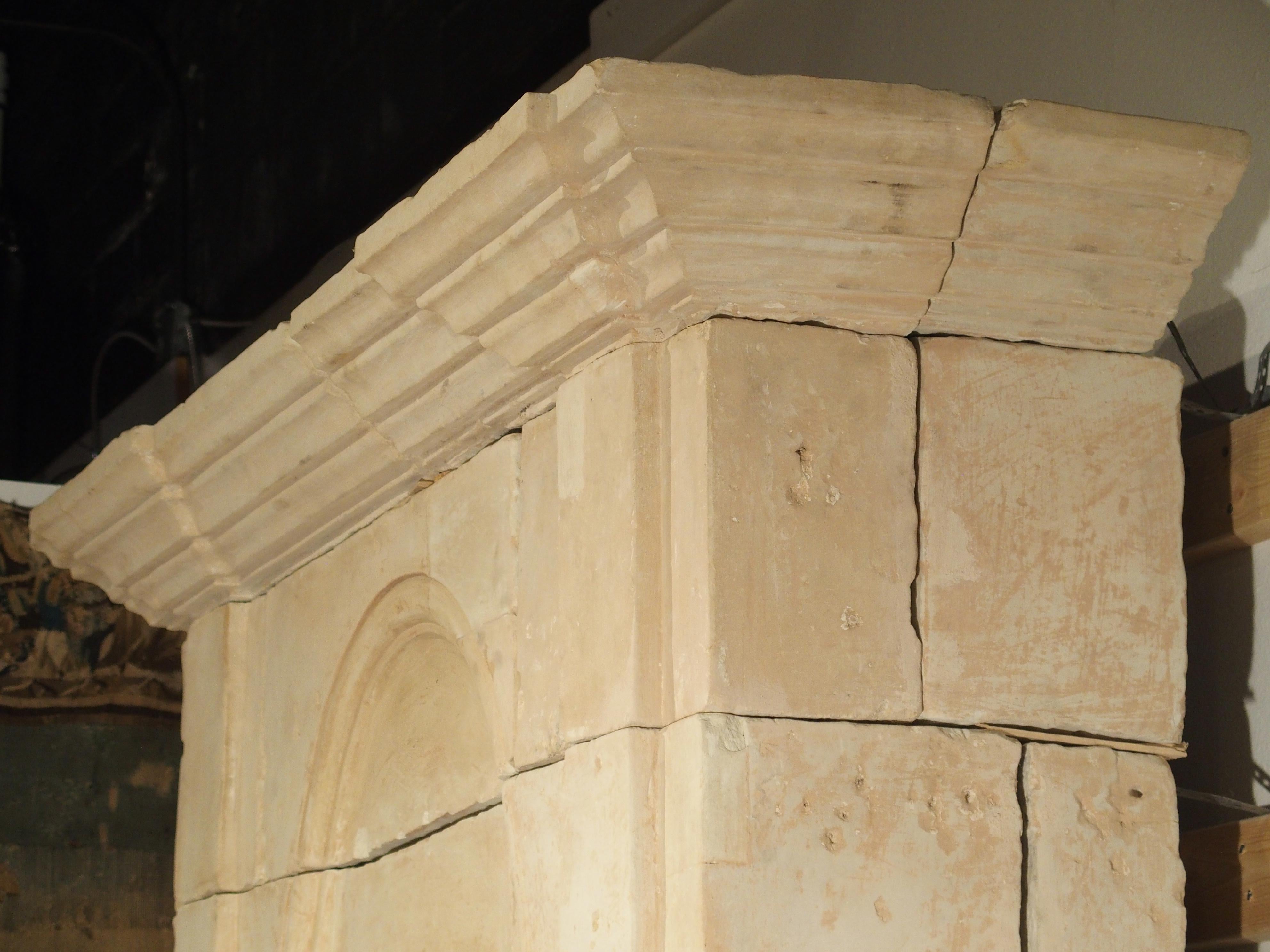 Louis XVI Early 1800s Carved Limestone Trumeau Fireplace Mantel from Loire Valley, France