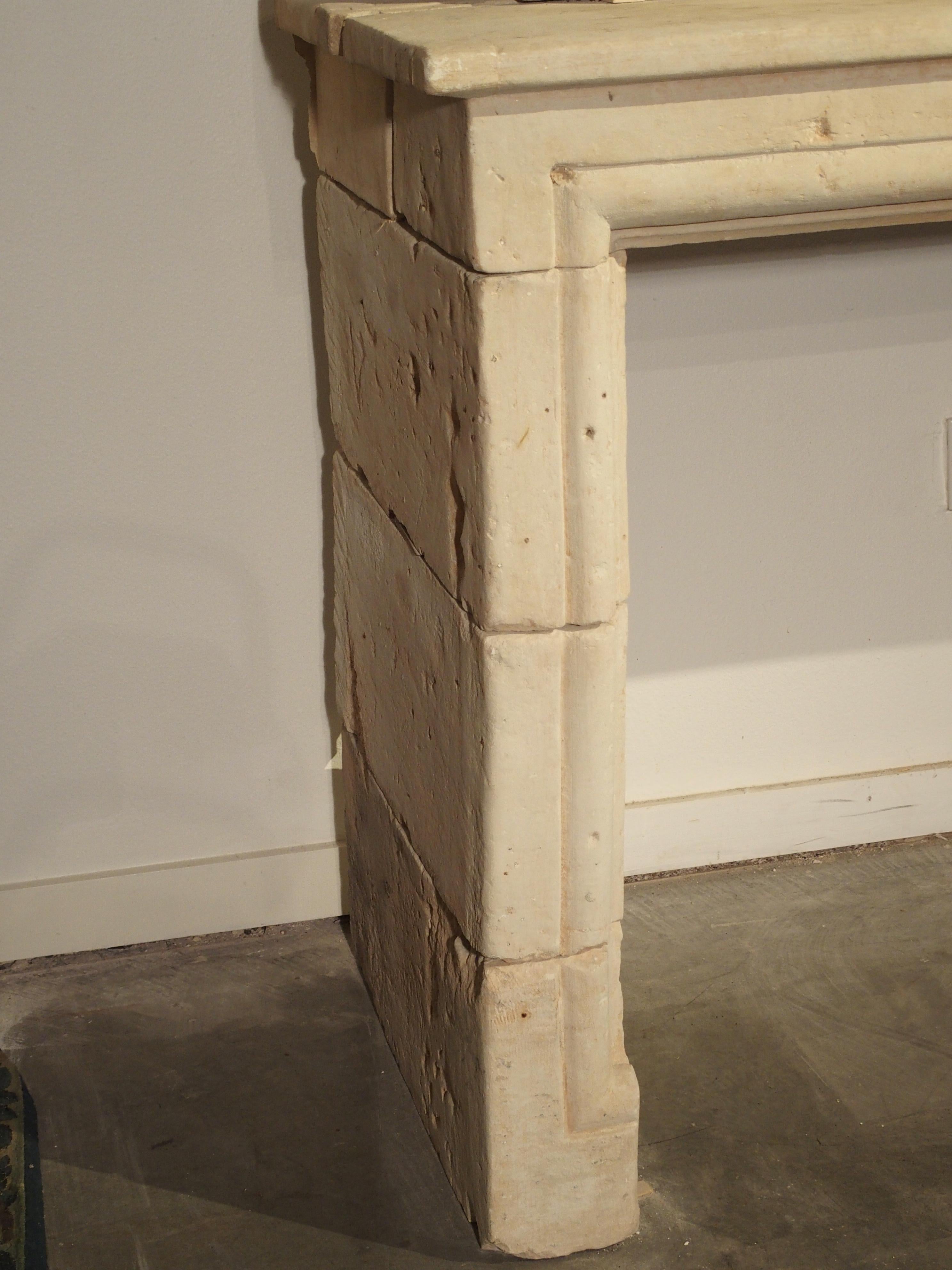 Early 1800s Carved Limestone Trumeau Fireplace Mantel from Loire Valley, France In Good Condition In Dallas, TX