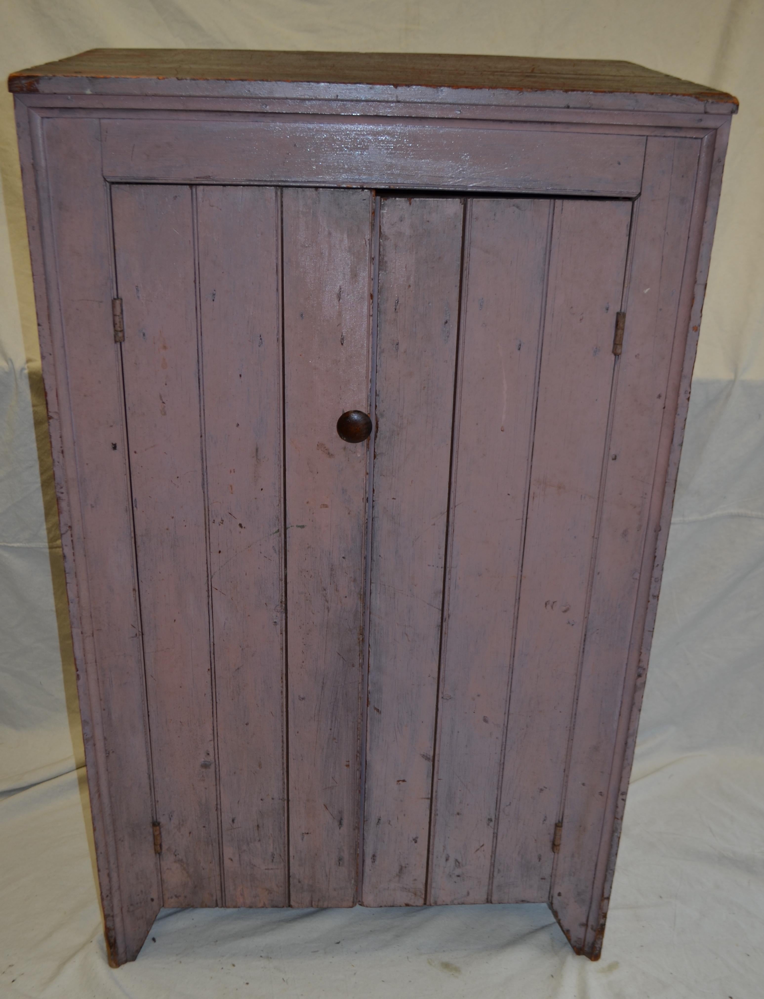 Early 1800s cupboard of double doors from parlor, kitchen, pantry. Classic Americana. Hand-crafted from the boards remaining from the home's interior construction in 1830. Truly original. From use, its top is beautifully mahoganized. Love the