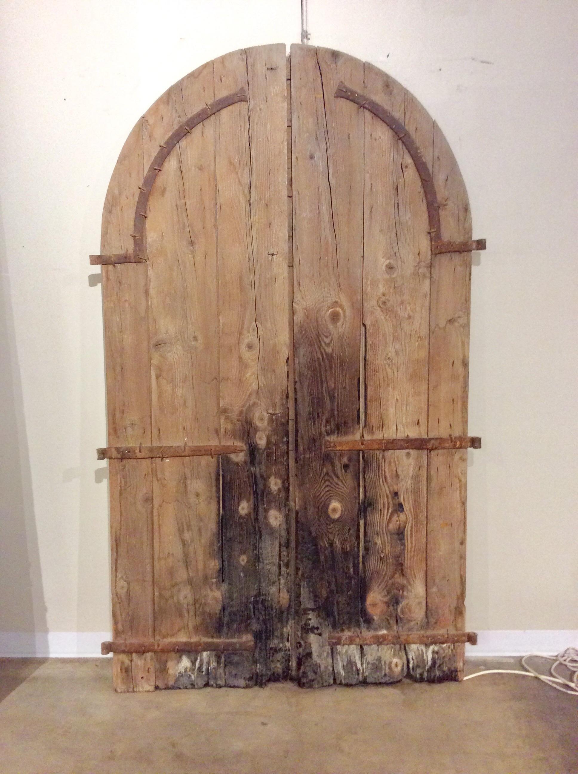 Early 1800s French Architectural Pine Arched Doors with Original Iron Hardware In Good Condition In Burton, TX