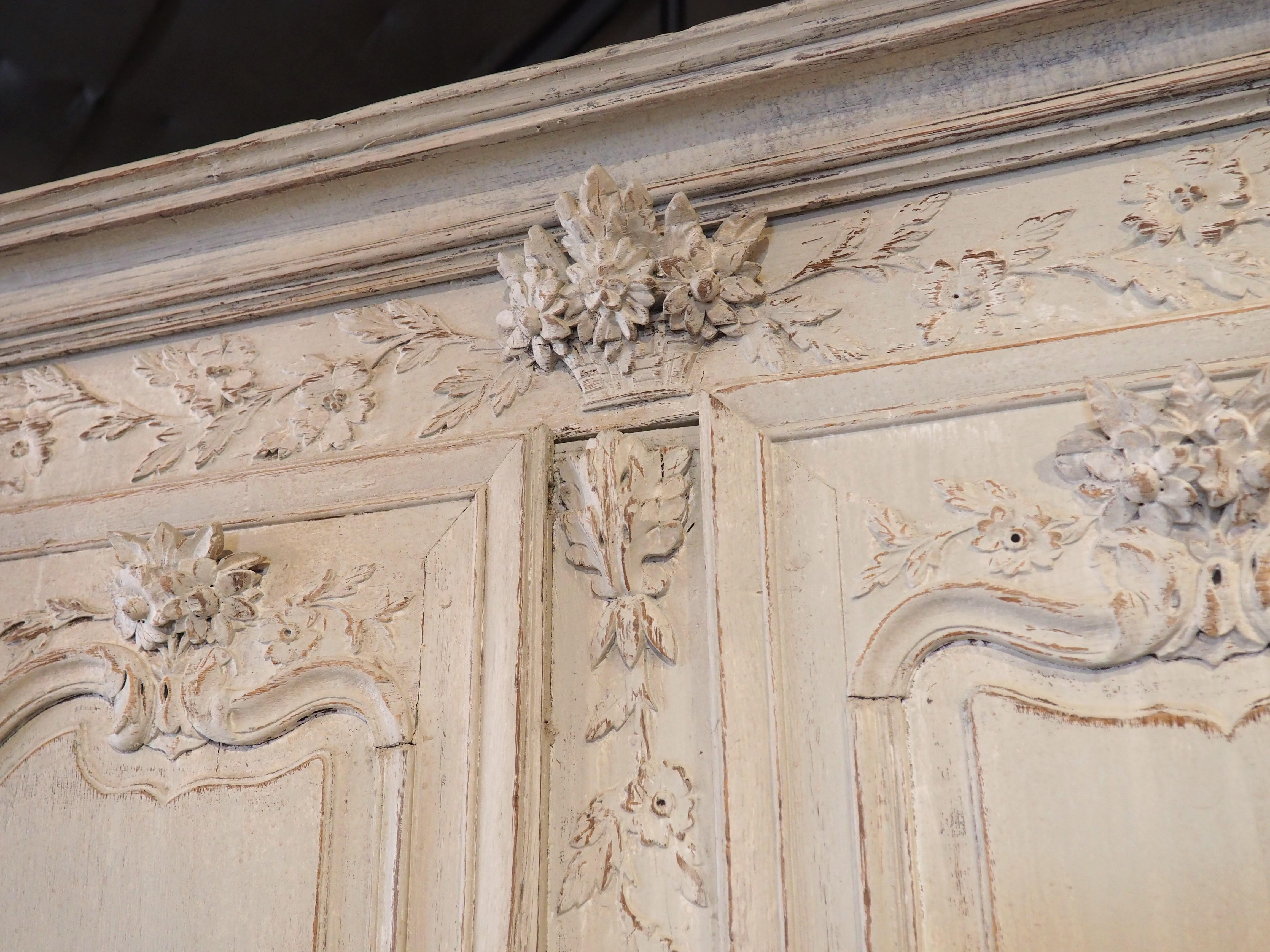Most antique French furnishings that originated from Normandy were made from oak, which is a durable hardwood that is rather difficult to carve. Based on the rich and artistic décor that graces the cabinet, this buffet deux corps was hand-carved in