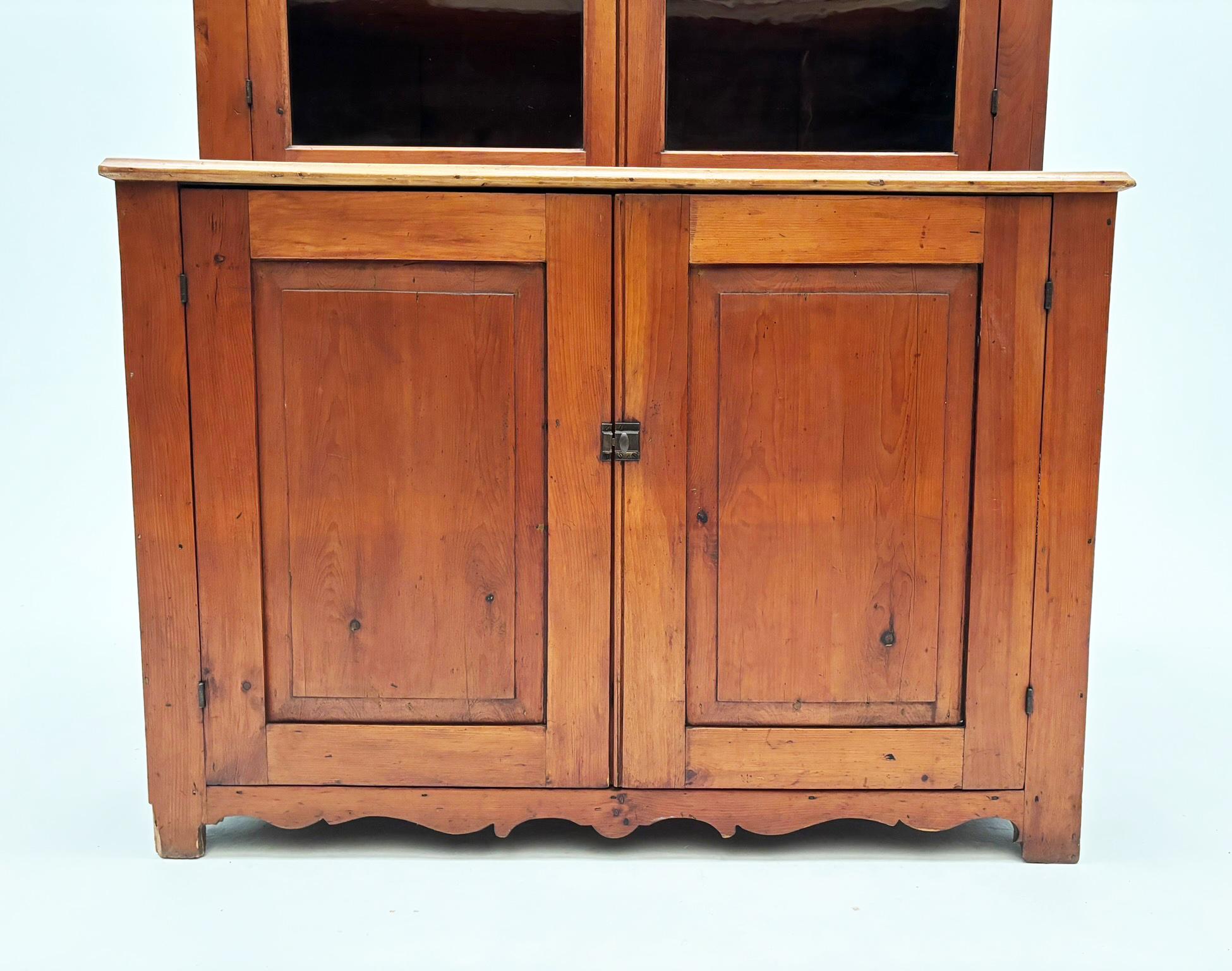 Hand-Crafted Early 1800’s Pennsylvania Dutch Pine Country Cupboard with Wavy Glass Doors For Sale