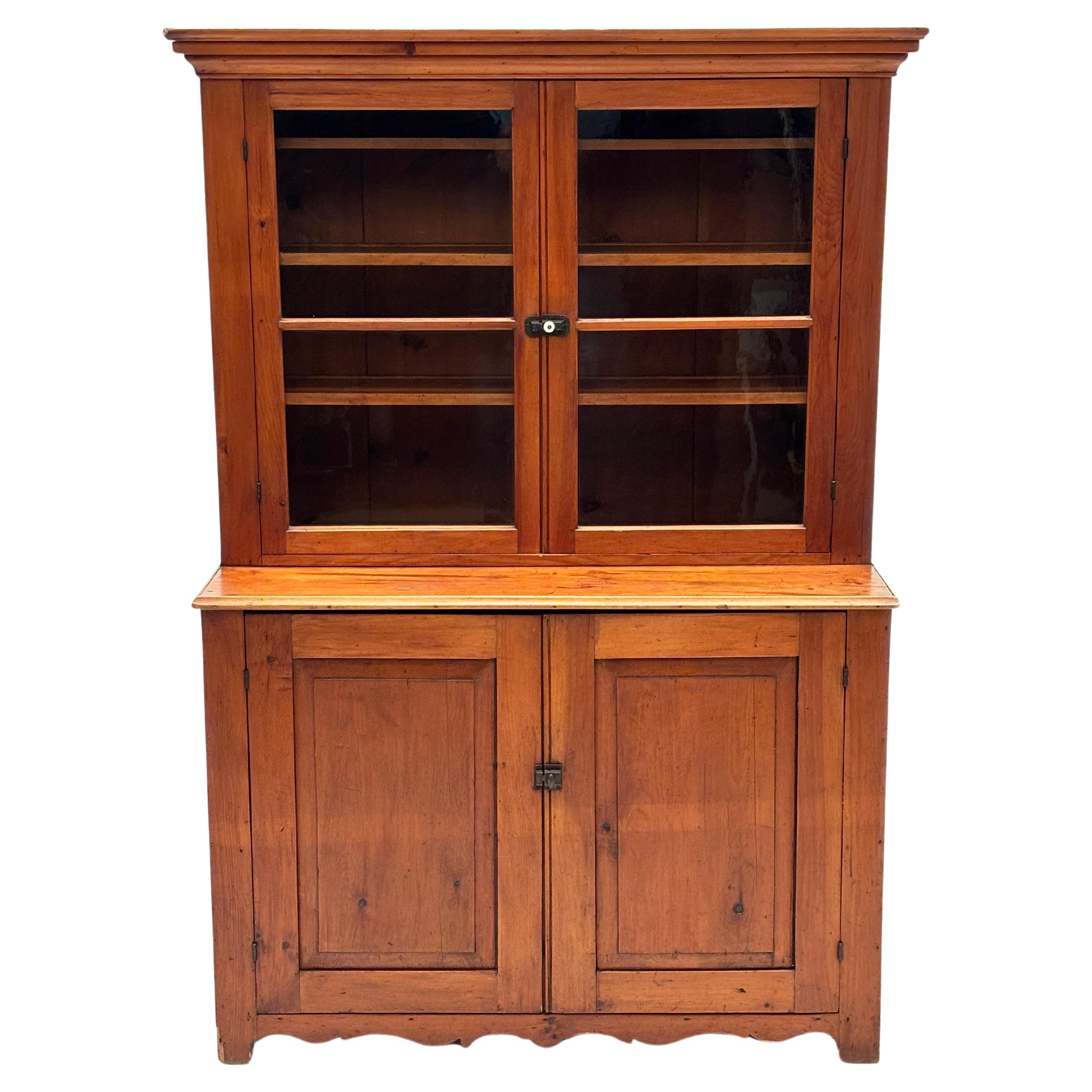 Early 1800’s Pennsylvania Dutch Pine Country Cupboard with Wavy Glass Doors For Sale