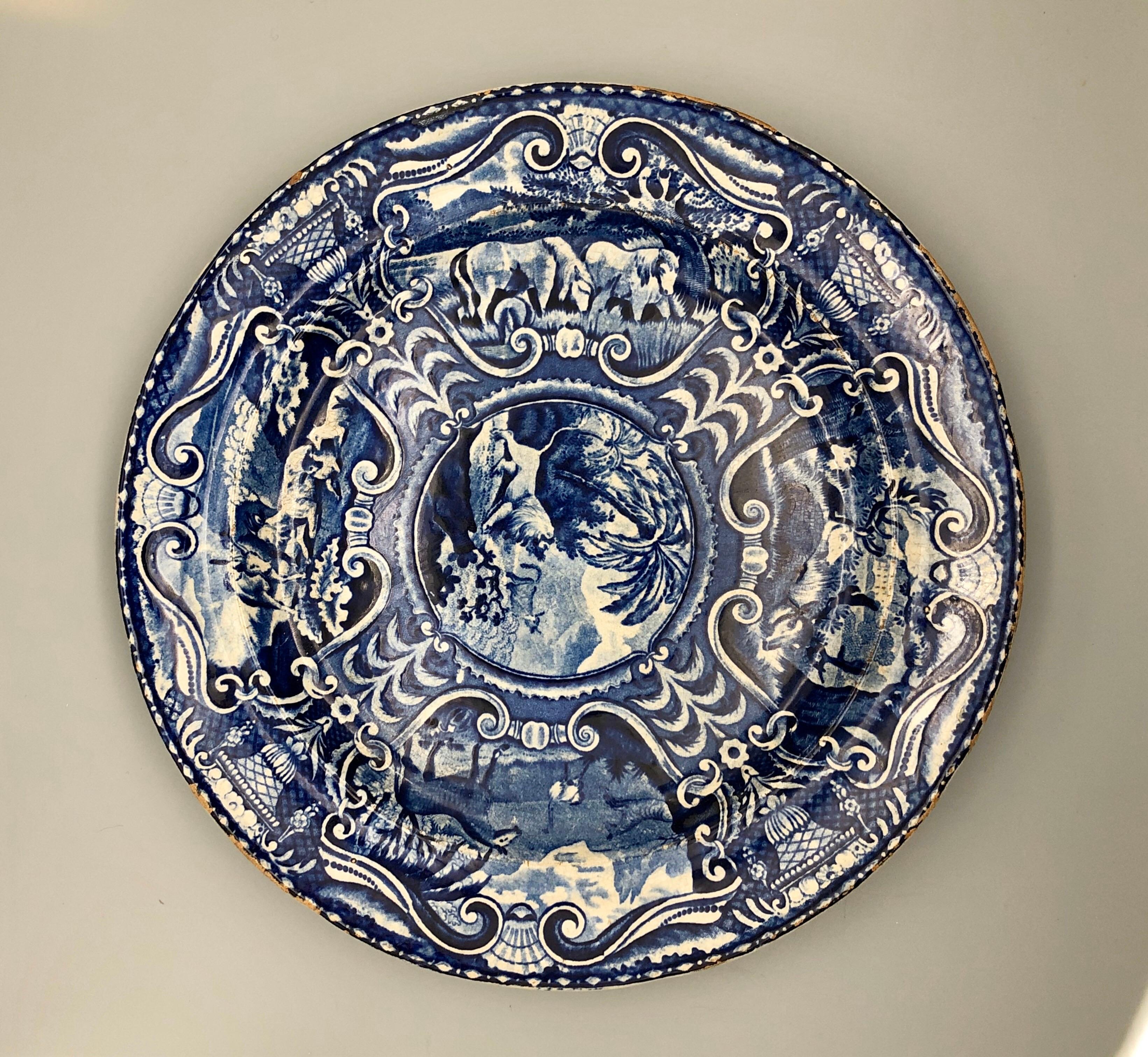 A rare blue and white Quadruped plate produced by brothers John and Ralph hall from 1802-1832. 

The Quadrupeds series is renowned for its animal images in various combinations. This eye-catching plate measures 10 x 10 x .75 inches deep and weighs