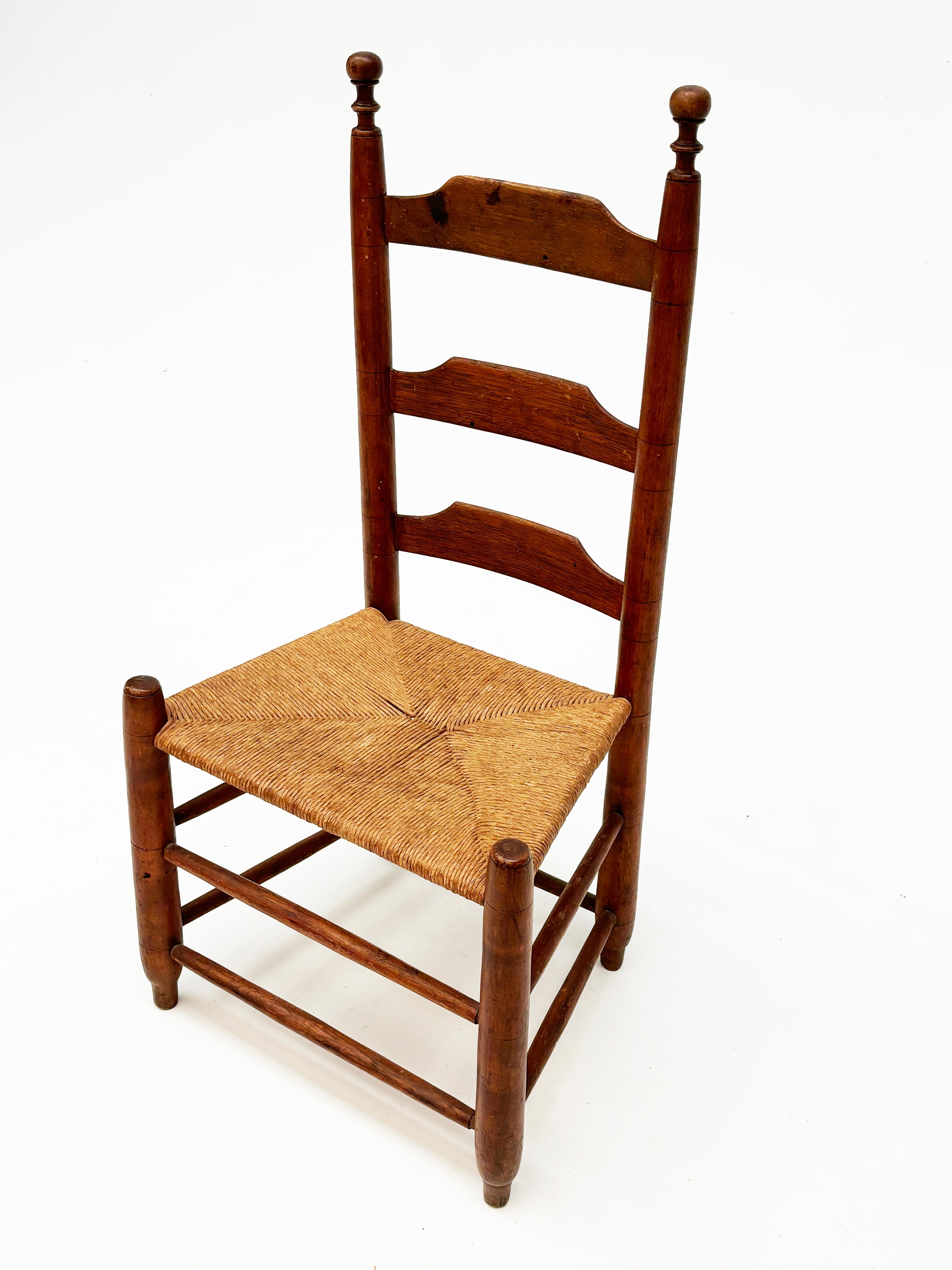 This three-slat ladder-back chair was most likely made in Pennsylvania in the early 1800’s. From the design, artisan verge markings on the legs and shape and characteristics of the finials, this chair was more than likely a farm house chair.

Chairs