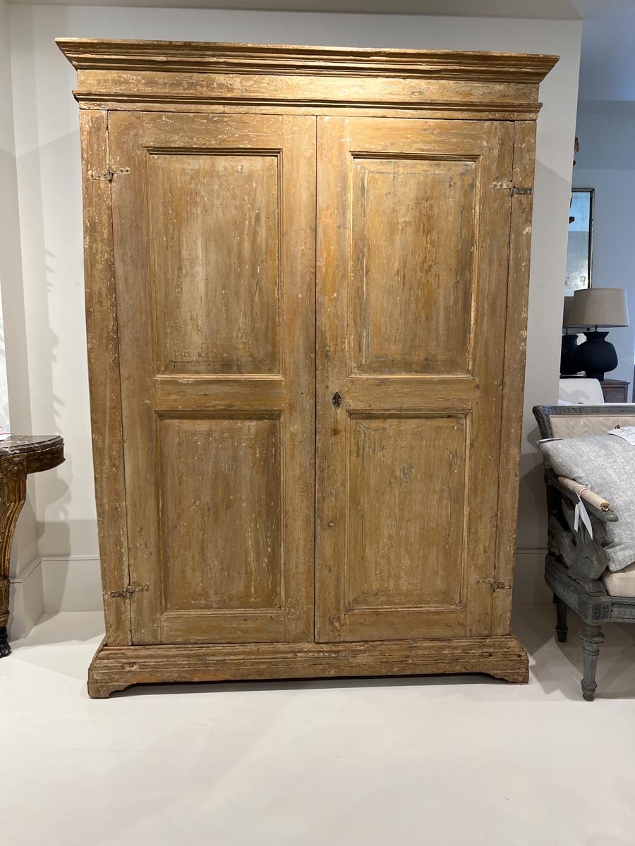 Beautiful patina and excellent condition are the hallmarks of this elegant armoire from Tuscany.