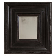 Miroir italien du début du XVIIIe siècle en bois d'ébène avec détails en guilloché, Italie, 1750