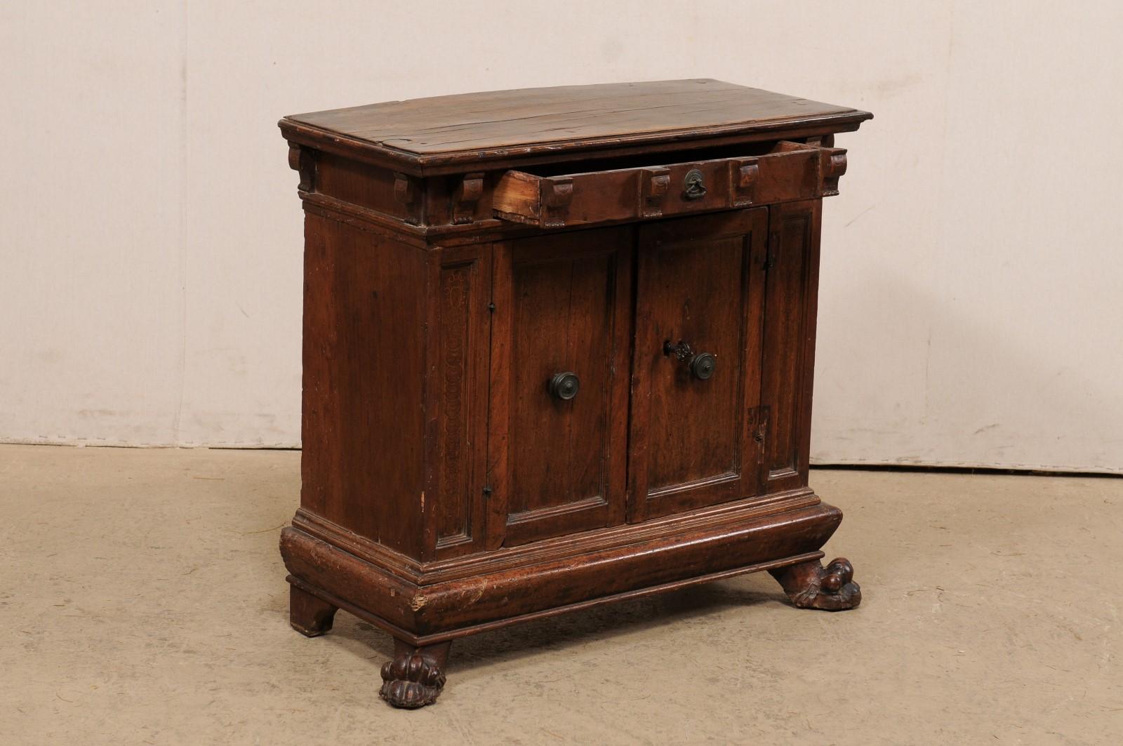 Early 18th C. Italian Two-Door Walnut Cabinet Presented on Paw Feet In Good Condition For Sale In Atlanta, GA