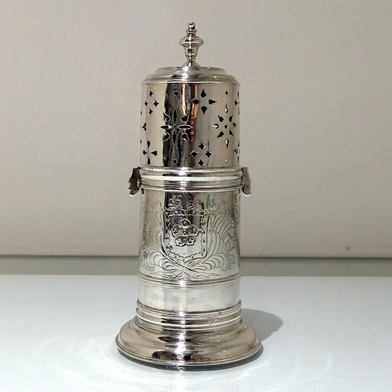 A rare and extremely beautiful “light house” sugar caster decorated with a stylish contemporary armorial. The locking bayonet lid has elegant piercing for dispensing crushed loaf sugar.

 

Weight: 10.9 troy ounces/342 grams

Height: 8