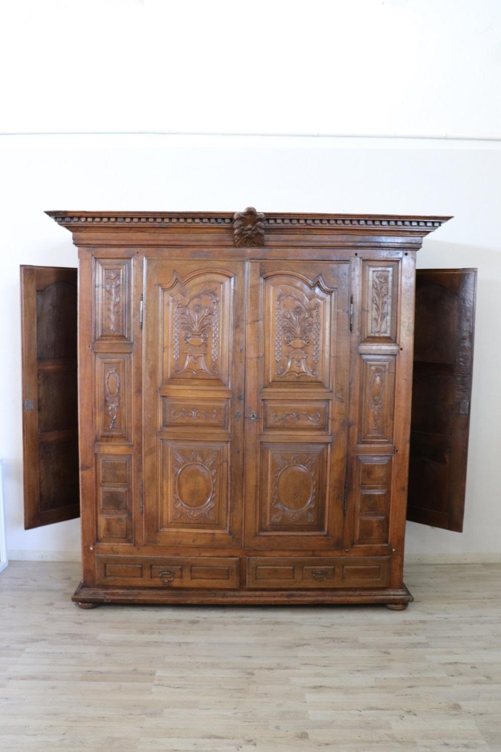 Italian Early 18th Century Baroque Carved Walnut Antique Wardrobe, Cabinet with Secrets