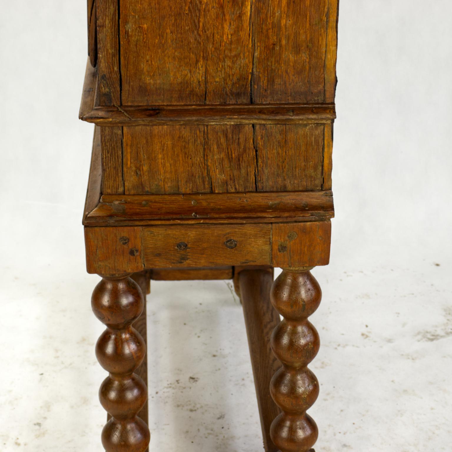 Early 18th Century Baroque Rustic Oak Cabinet on High Stand For Sale 4