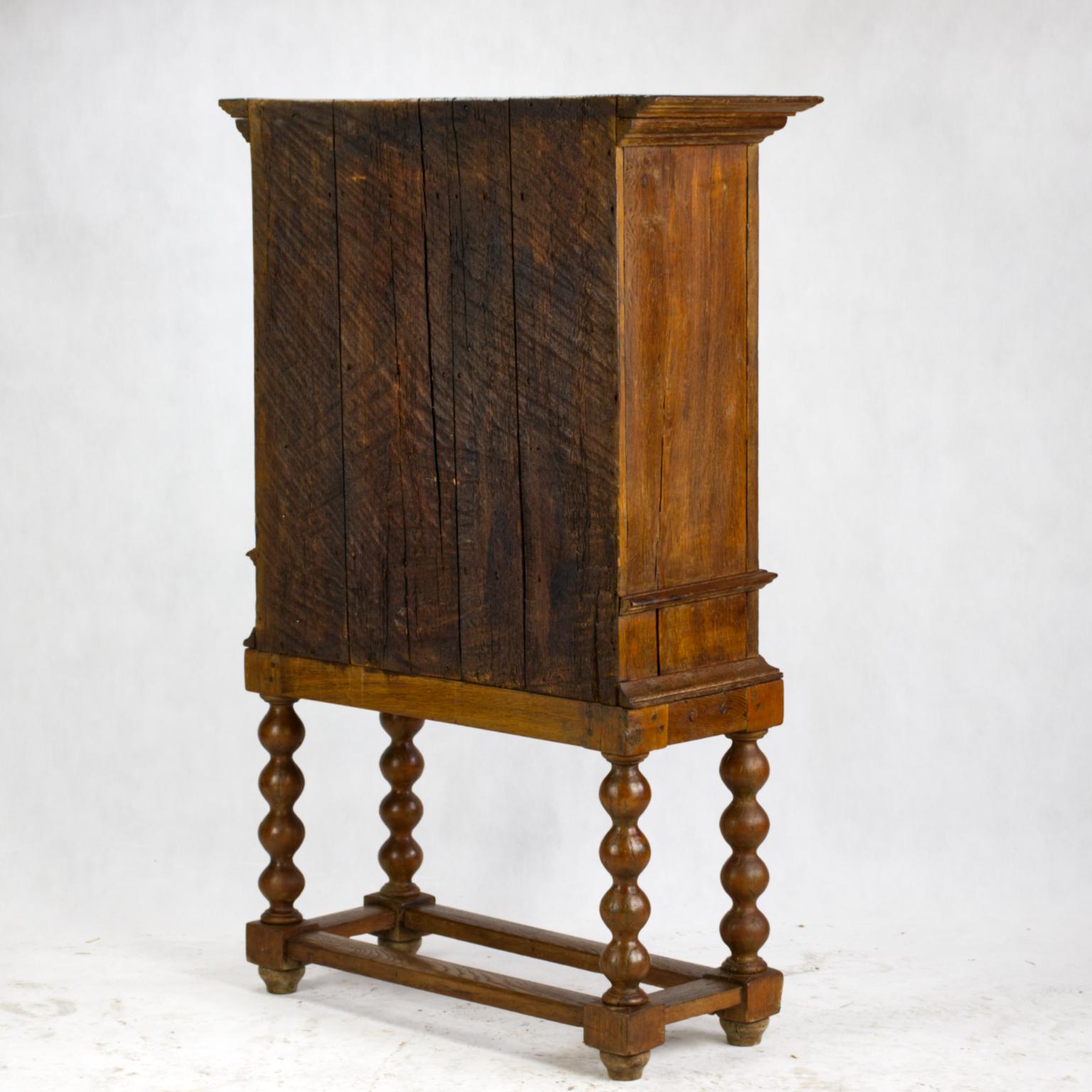 Early 18th Century Baroque Rustic Oak Cabinet on High Stand For Sale 1