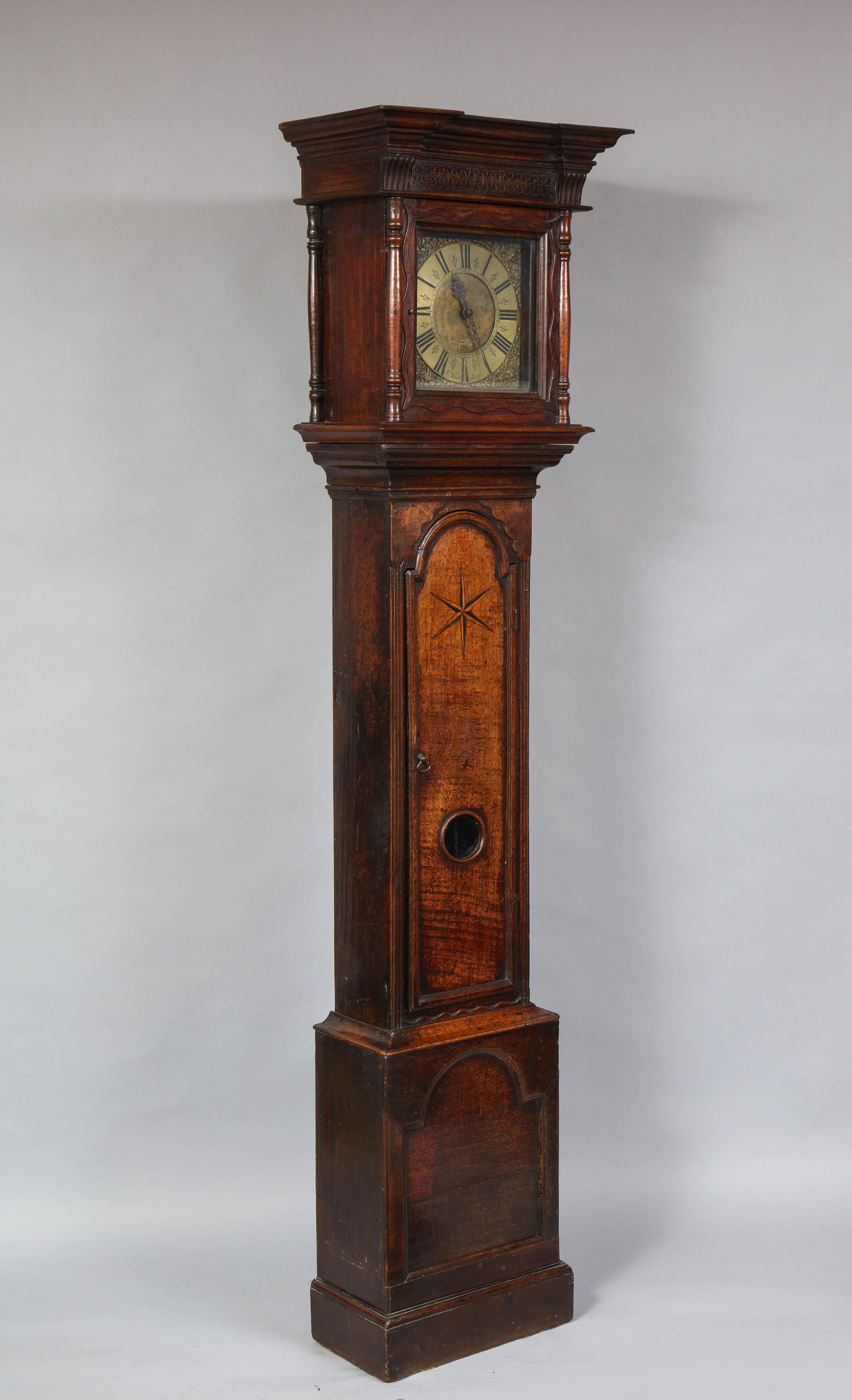 Very fine early 18th century oak cased brass dial clock by Richard Wood. This highly unusual and characterful case showing many quirks found in Welsh and Shropshire furniture and its not surprising to find the movement was made by one of the leading