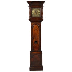 Horloge à cadran en laiton du début du 18e siècle