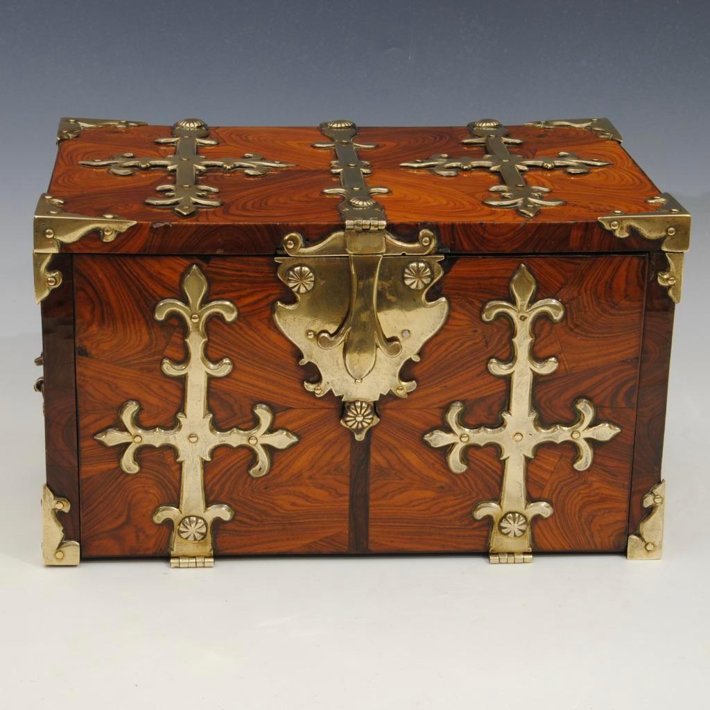 An early 18th century oyster veneer king wood Coffre Fort, with the original brass mounts. The fall front opens to reveal two small drawers and two secret ones. The oyster cut veneers to the top create heart shapes.
Of beautiful color and design.
