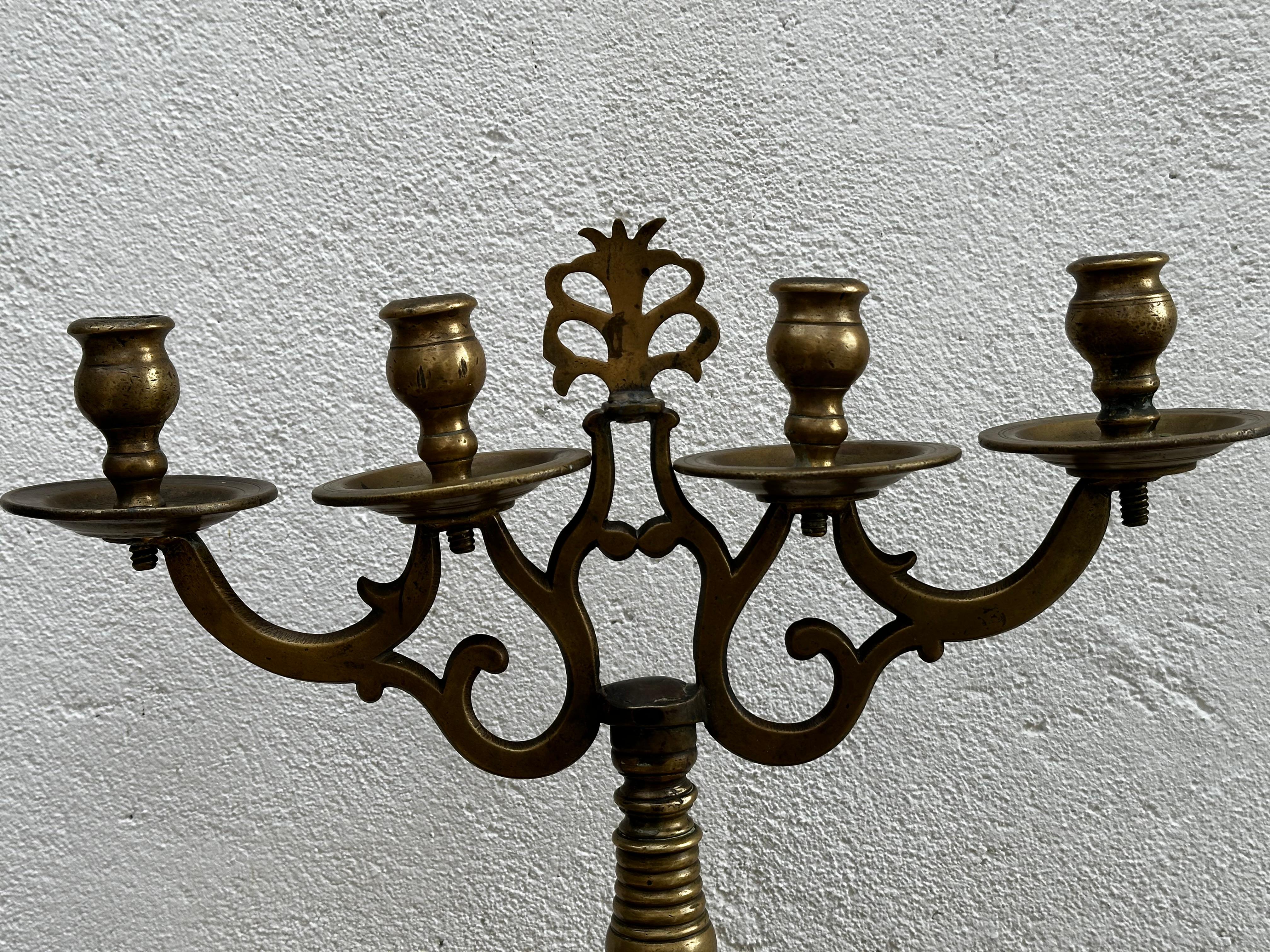 Large candelabra, presumably made in Sweden in early 18th century. 
Highly unusual, made in brass, with four candle holders.