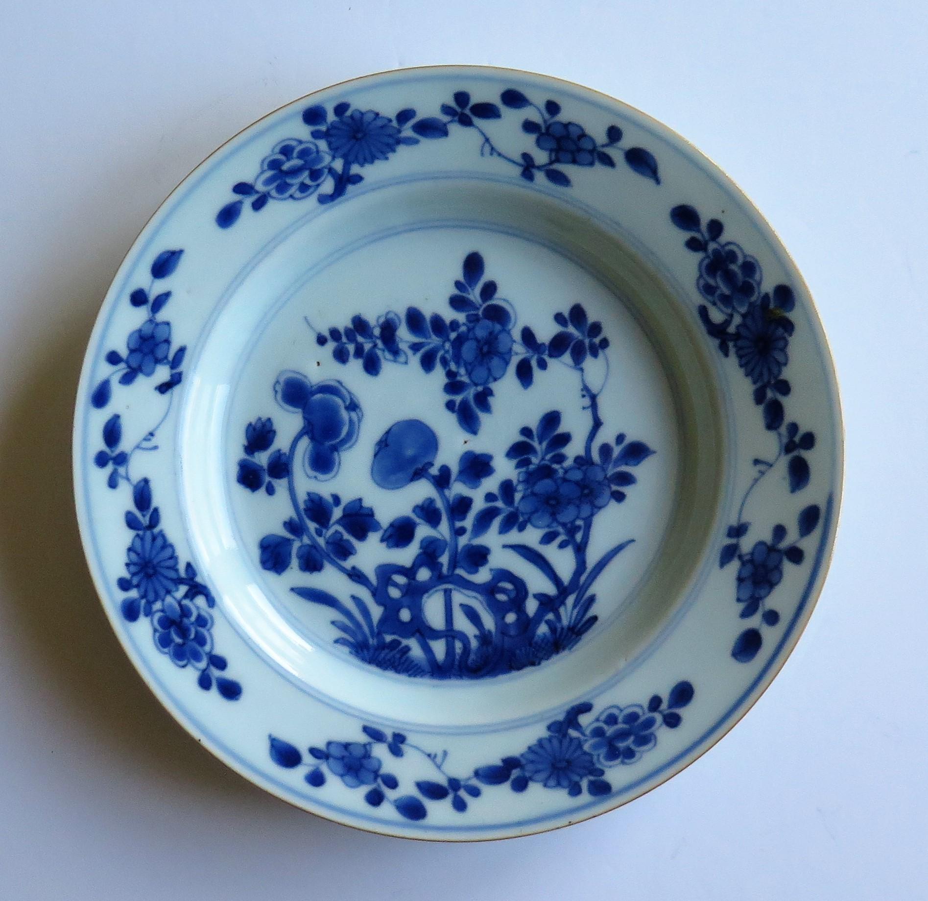 This is a beautiful hand painted Chinese porcelain plate or dish, dating to the first half of the 18th century, circa 1720-1740, Qing dynasty.

The plate is well potted, and has been hand decorated in a lovely free flowing manner in varying shades