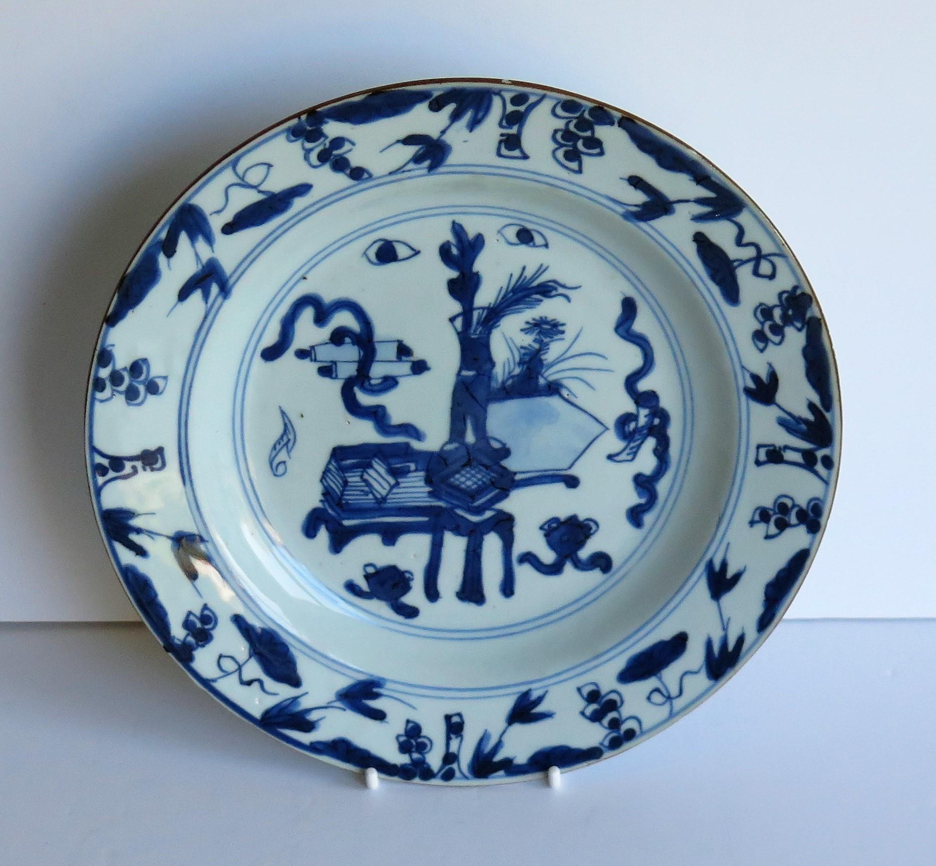 This is a good hand painted Chinese porcelain plate, dating to the early half of the 18th century, circa 1720-1740, Qing dynasty.

The plate is well potted, and has been hand decorated in varying shades of cobalt blue including a deep dark blue. The