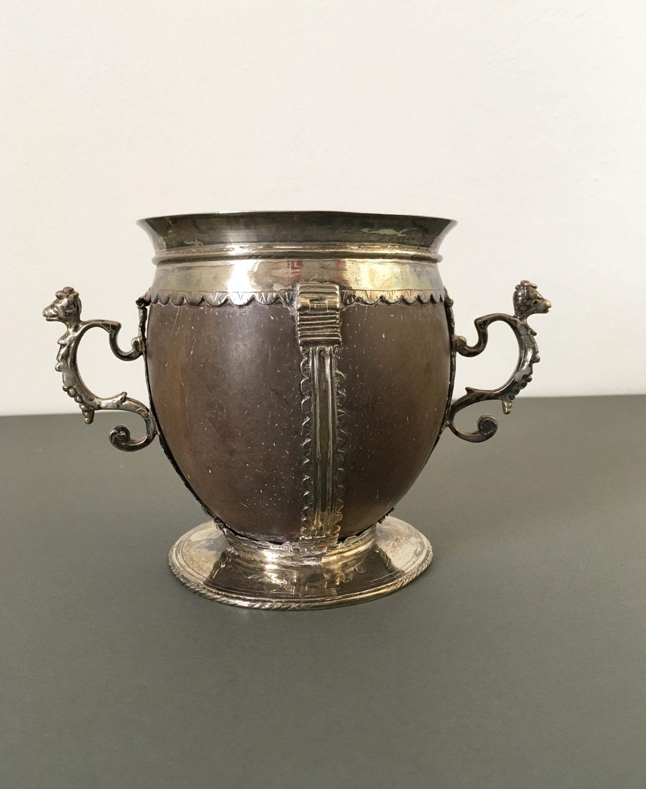 Cups in coconut such as this are especially uncommon and rarely appear on the world's art market. This is a very interesting piece for its fine and rich craftmenships metal silver decor, handmade in Early 18th century in the North part of Europe,