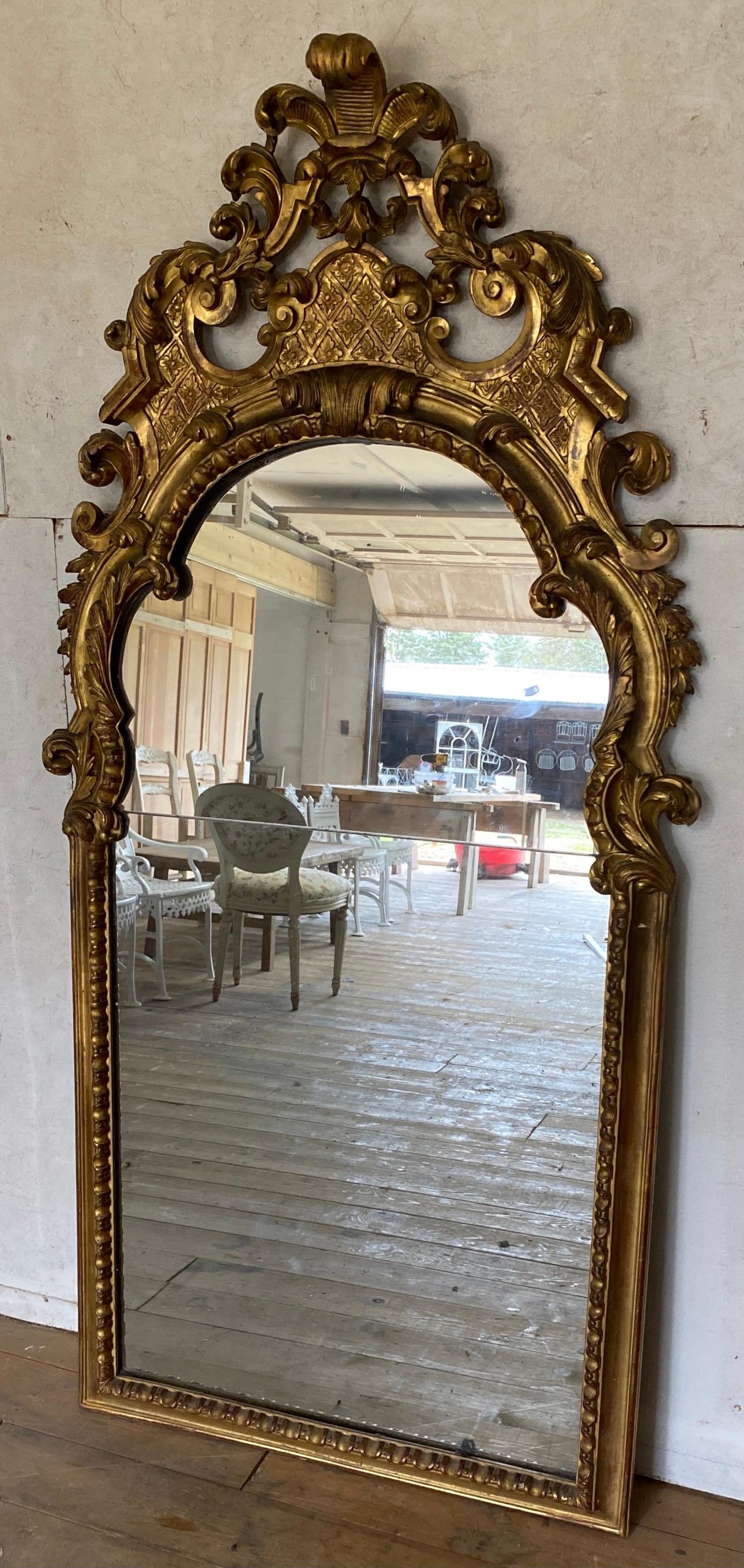 French Early 18th Century Continental Giltwood Pier Louis XIV Style Baroque Mirror