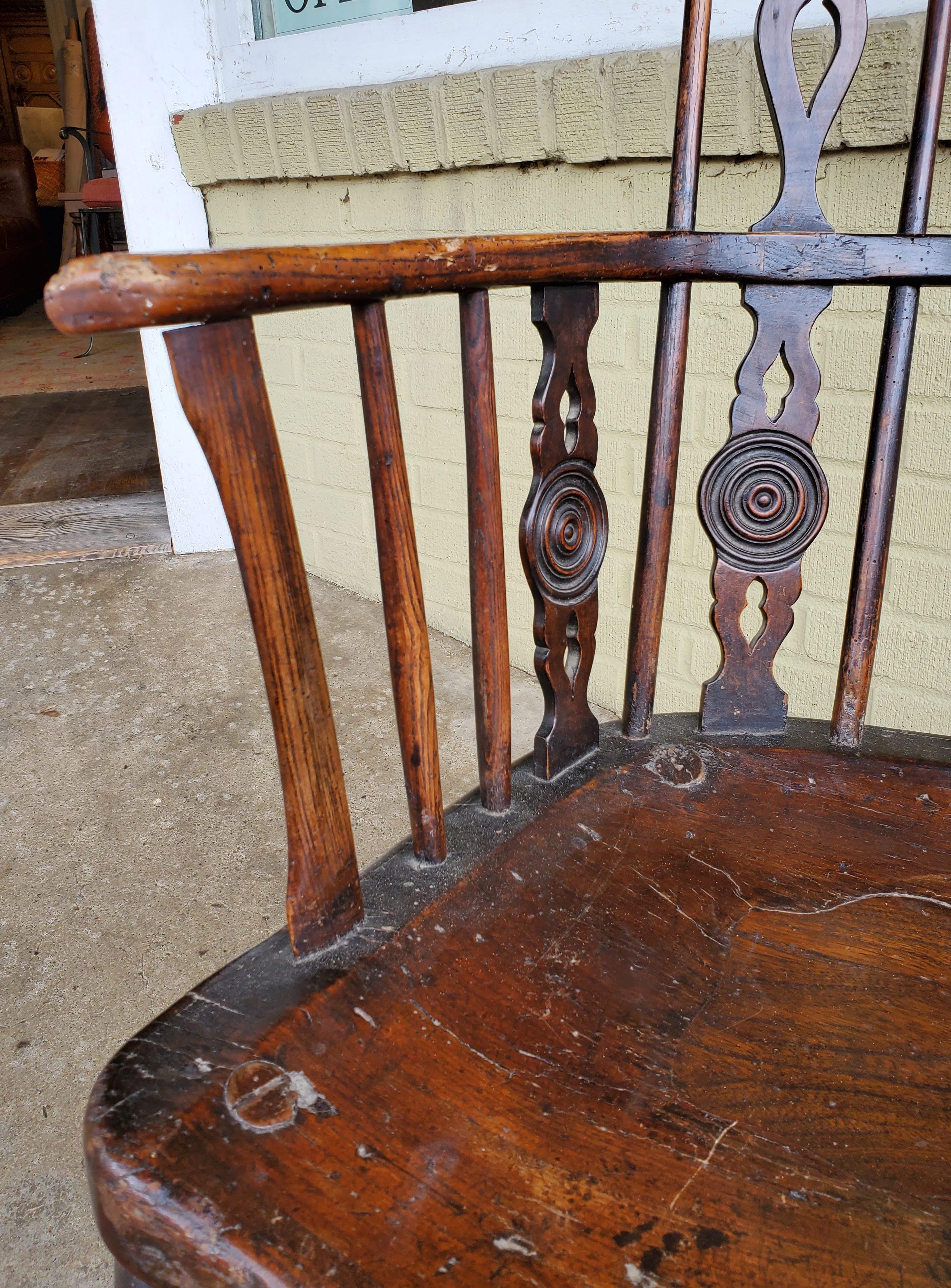 Early 18th Century English Comb-Back Windsor Armchair Dark Ash, Elm, Walnut 3